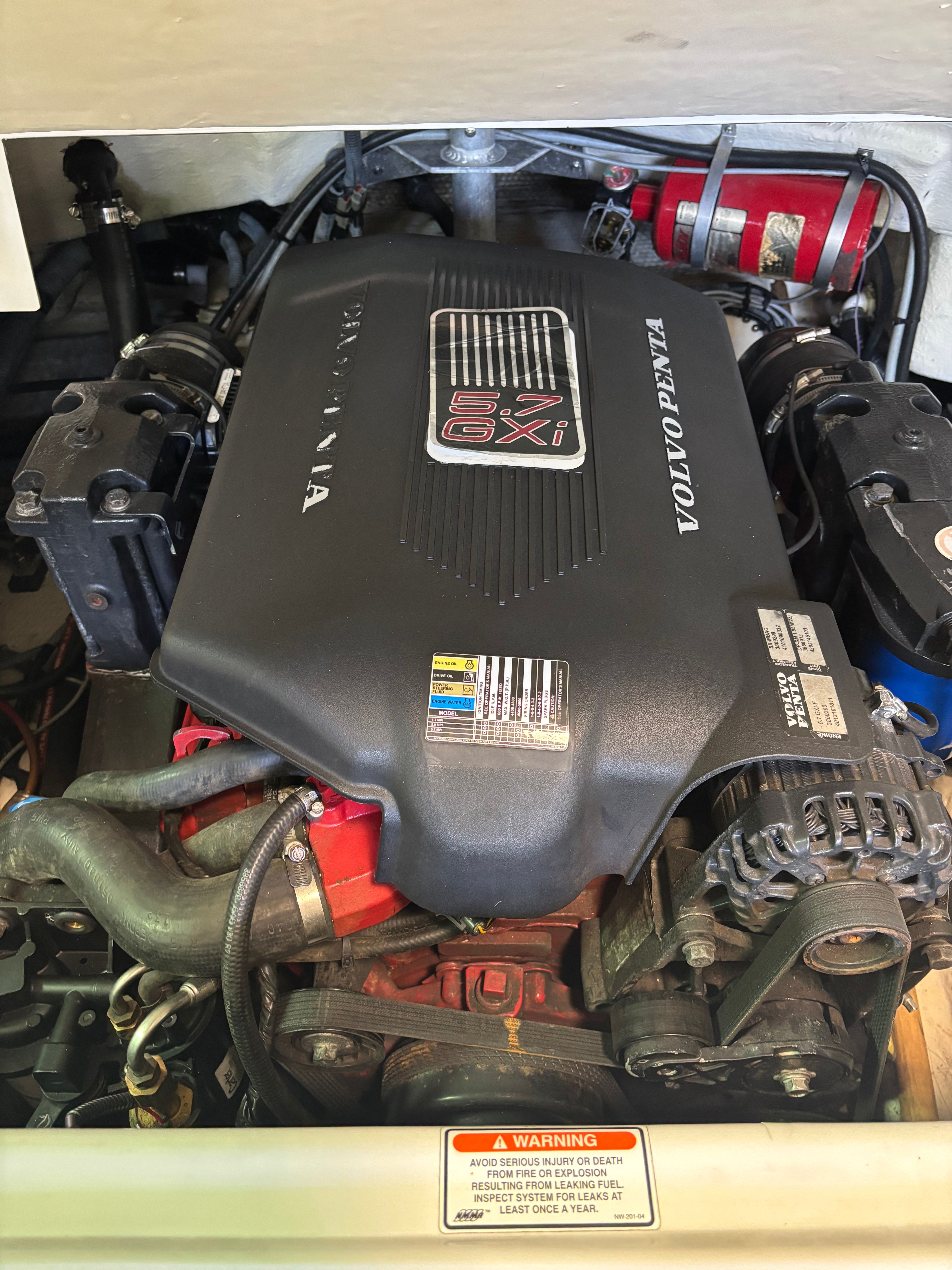 Engine compartment of a 2006 Regal 2200 Bowrider with a Volvo Penta engine.