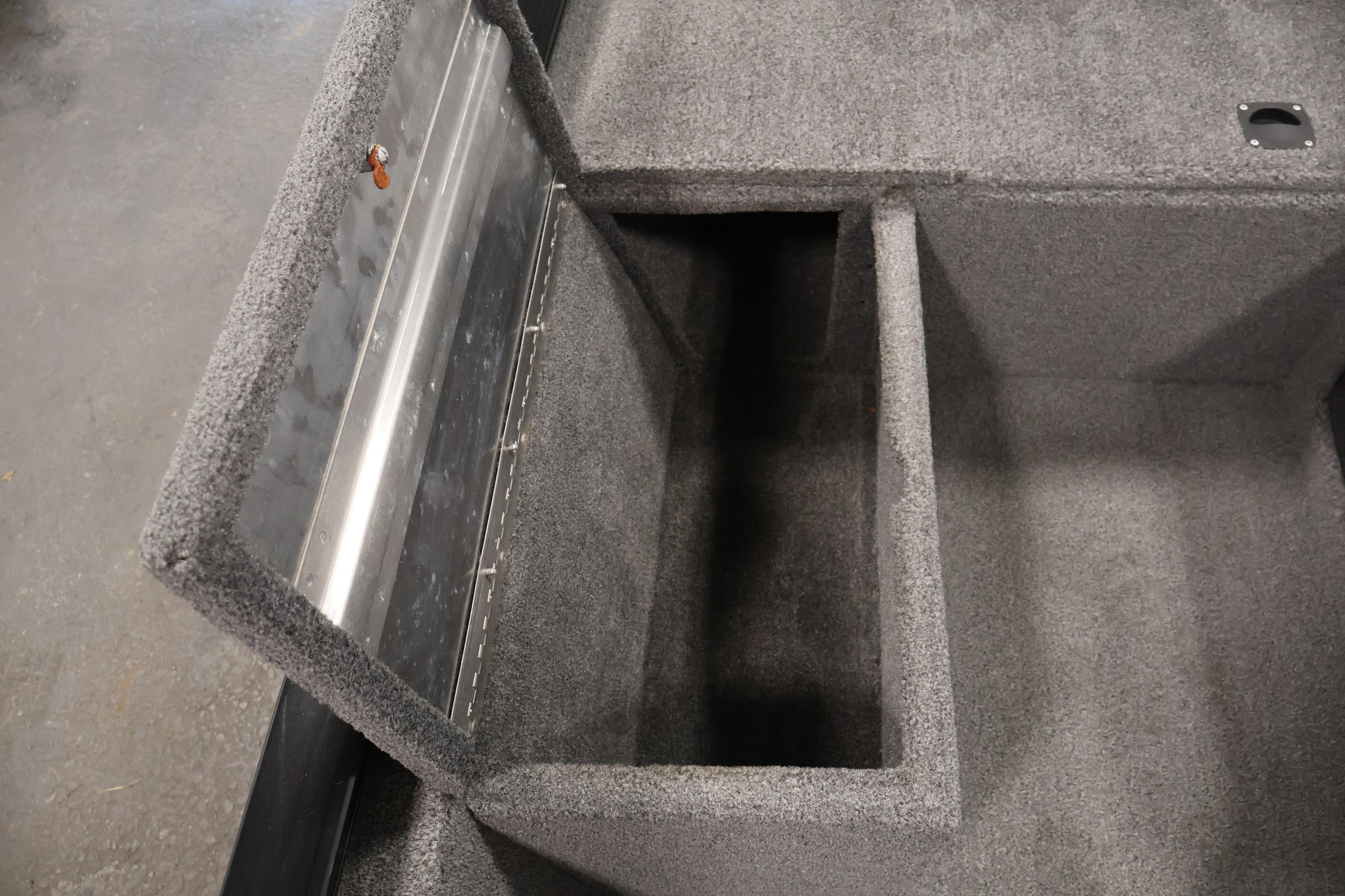 2024 Tracker Pro 170 storage compartment with open lid, showcasing interior space.