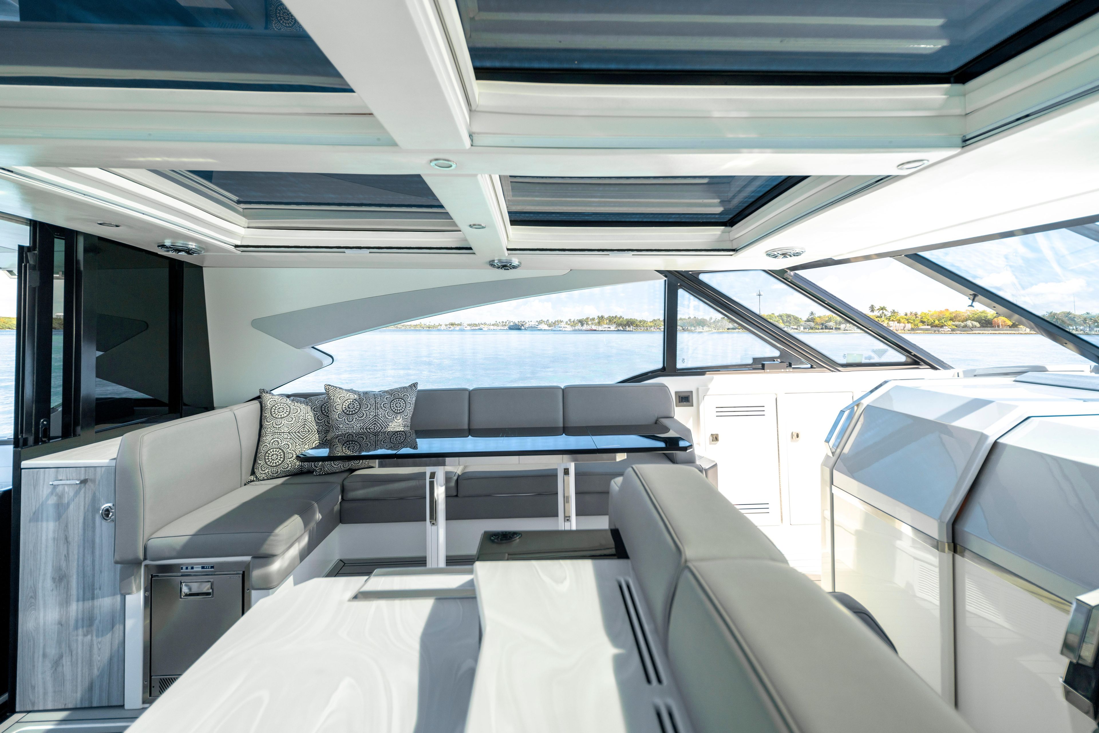 Luxurious interior of 2022 Formula 500 Super Sport Crossover yacht with panoramic windows.