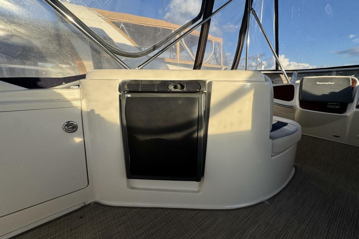 2008 Meridian 459 Motoryacht interior with seating and navigation equipment.