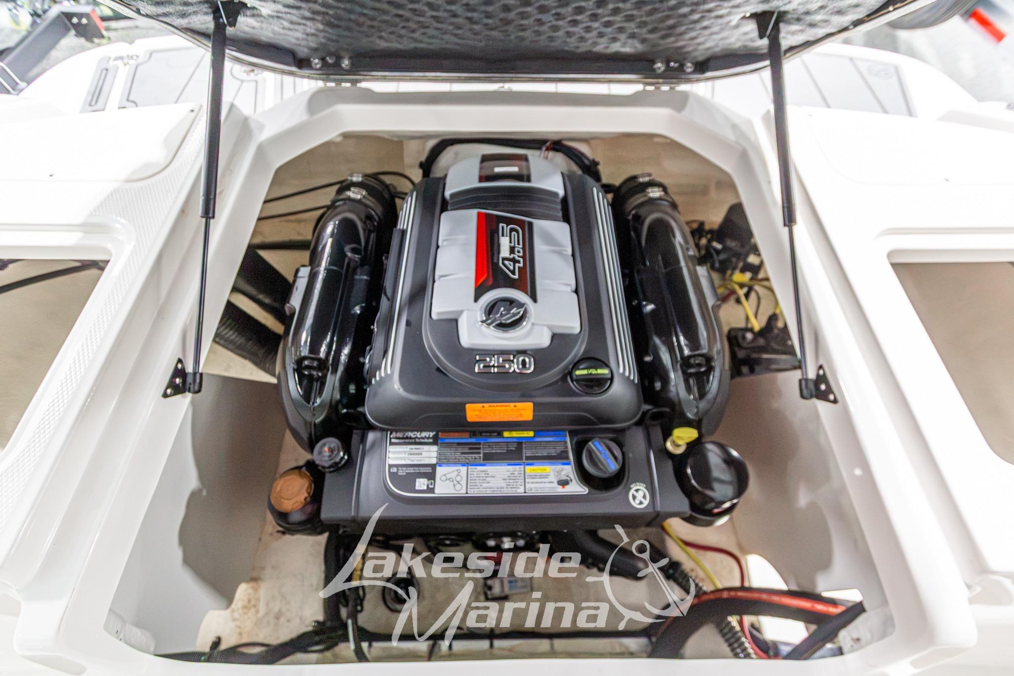 2022 Chaparral 21 SSi boat engine compartment with Mercury 4.5L engine at Lakeside Marina.