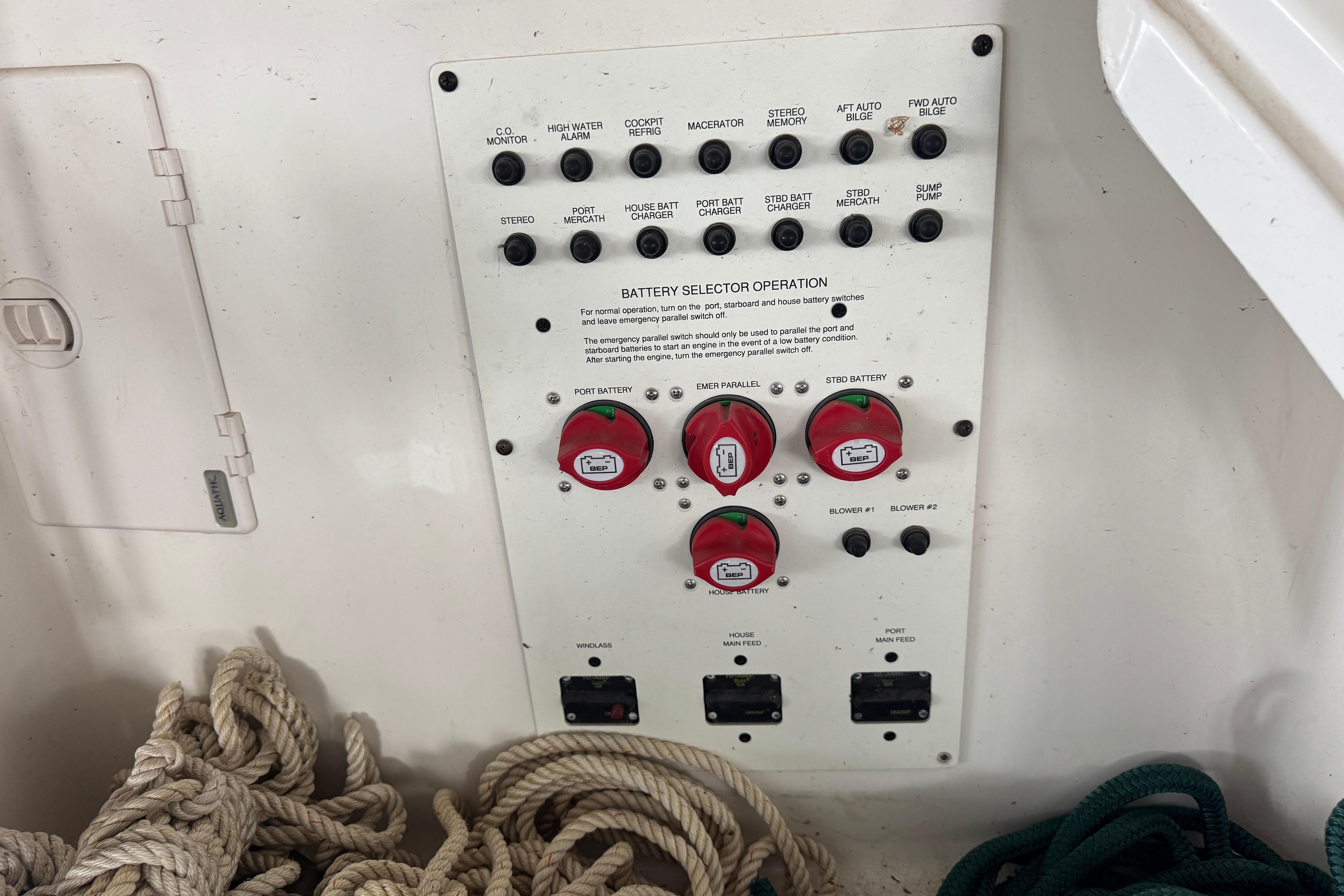 Control panel of a 2006 Chaparral 330 Signature boat with ropes nearby.