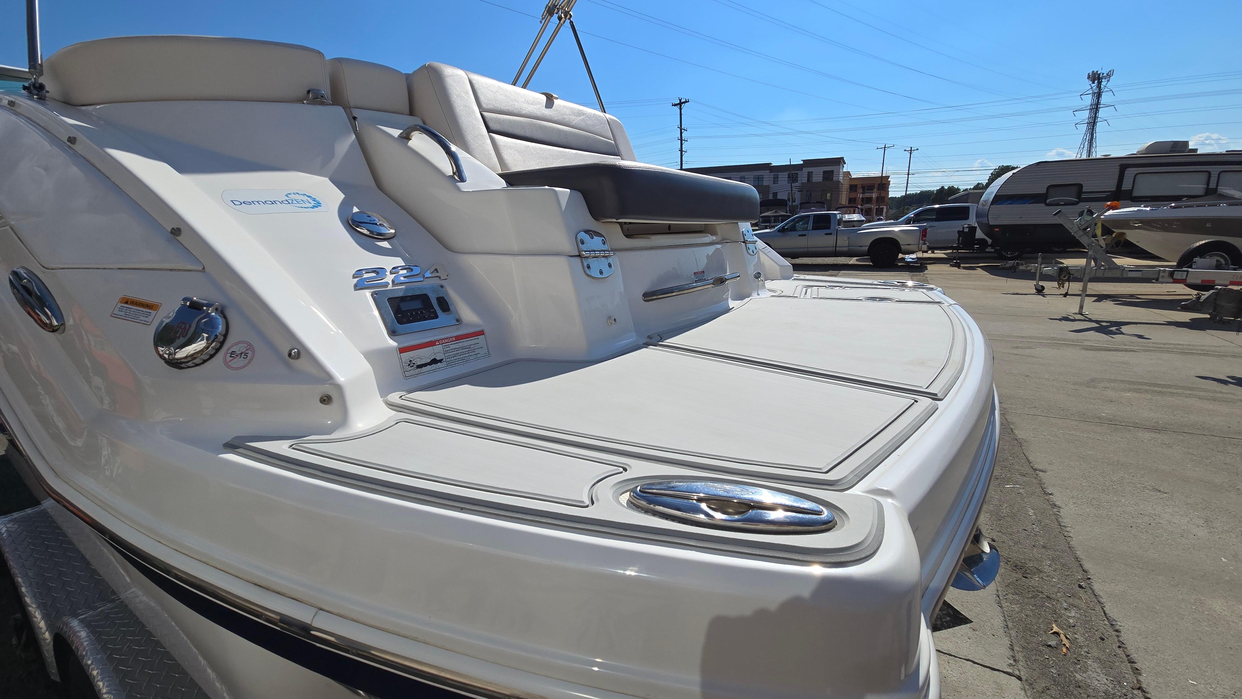 2018 Chaparral 224 Sunesta boat rear view, showcasing swim platform and seating.