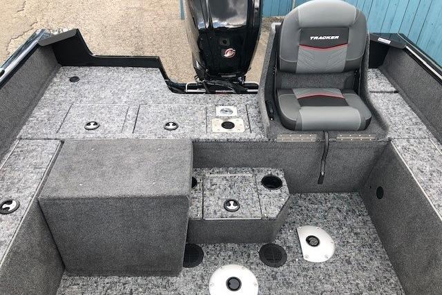 2026 Tracker Pro Guide V-175 Combo boat interior with seating and storage compartments.