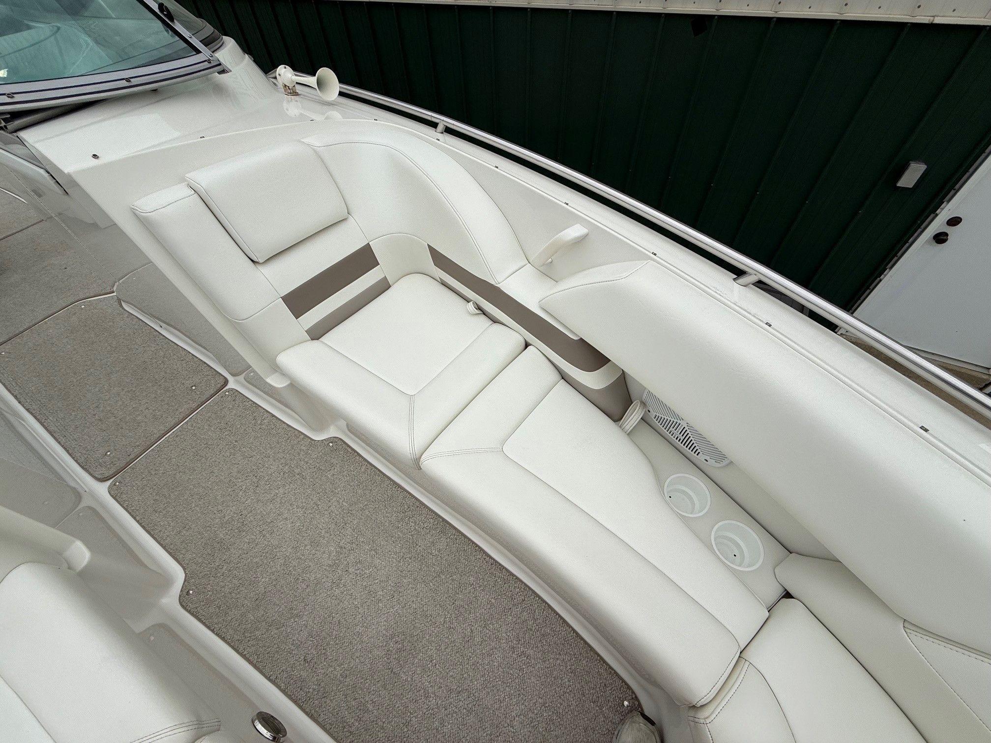 Interior of a 1998 Formula Thunderbird boat with white seating.