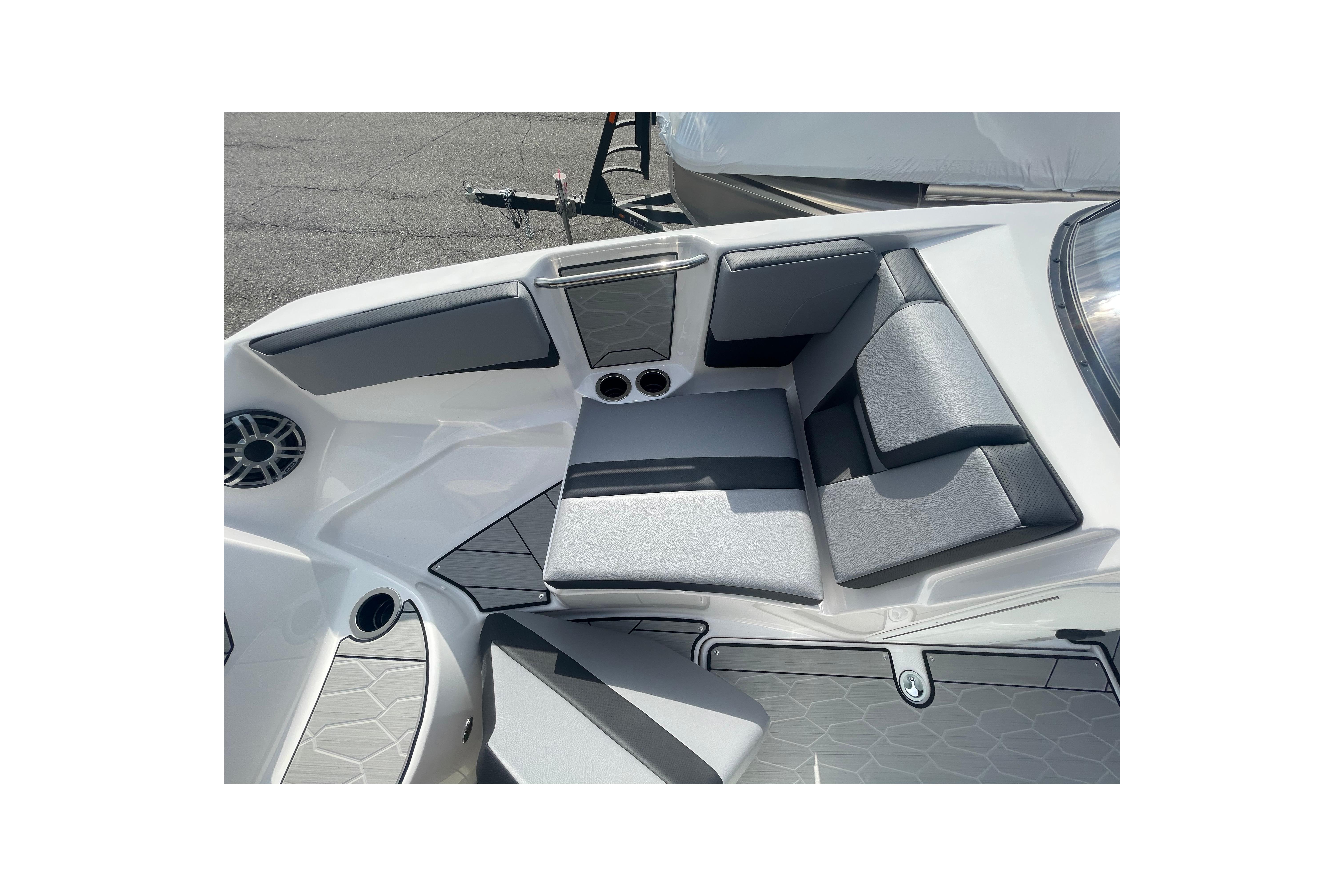 2026 Yamaha Boats 222XD interior seating with gray upholstery and cup holders.