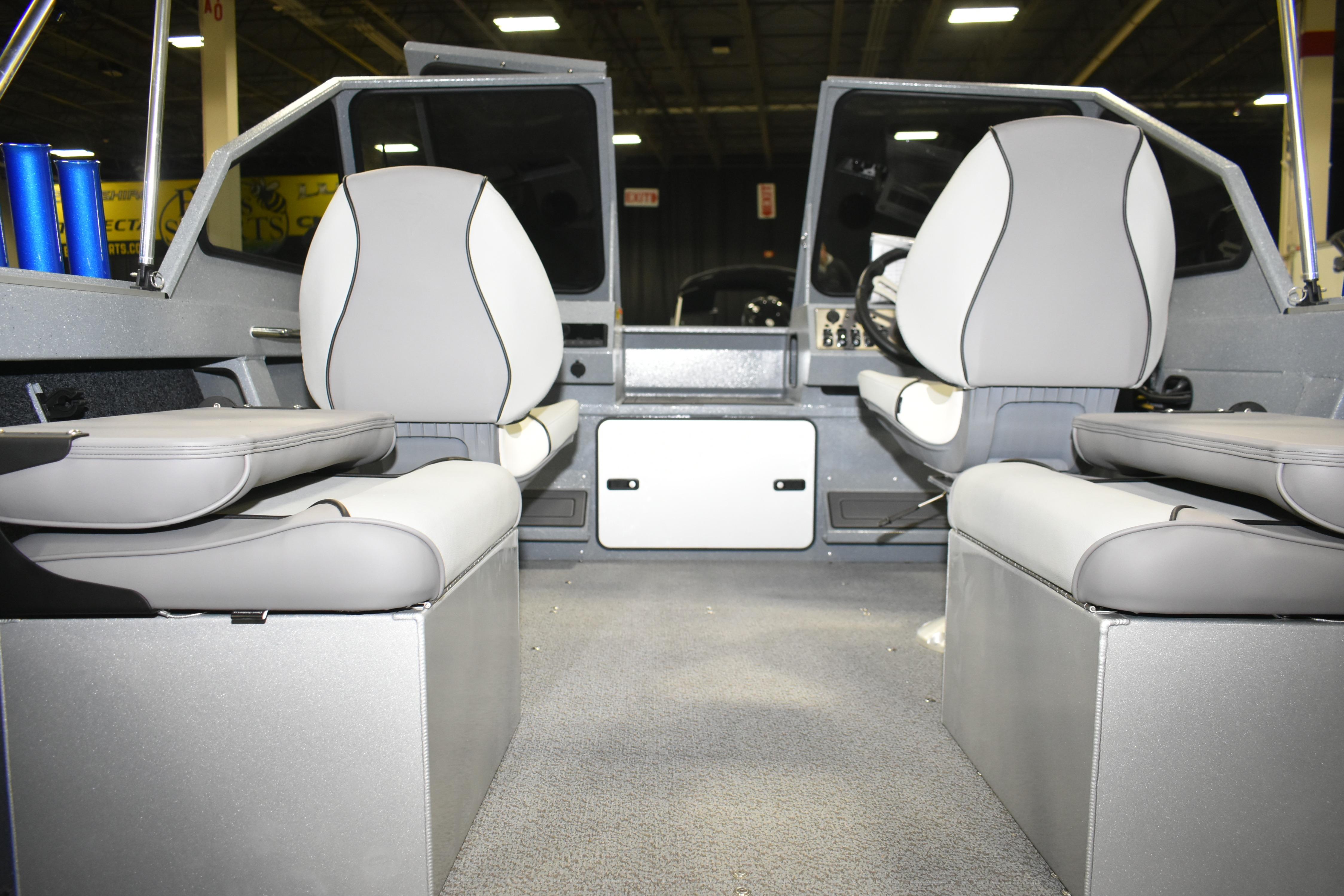 Interior of 2026 KingFisher 1825 Falcon boat with gray seating and modern design.
