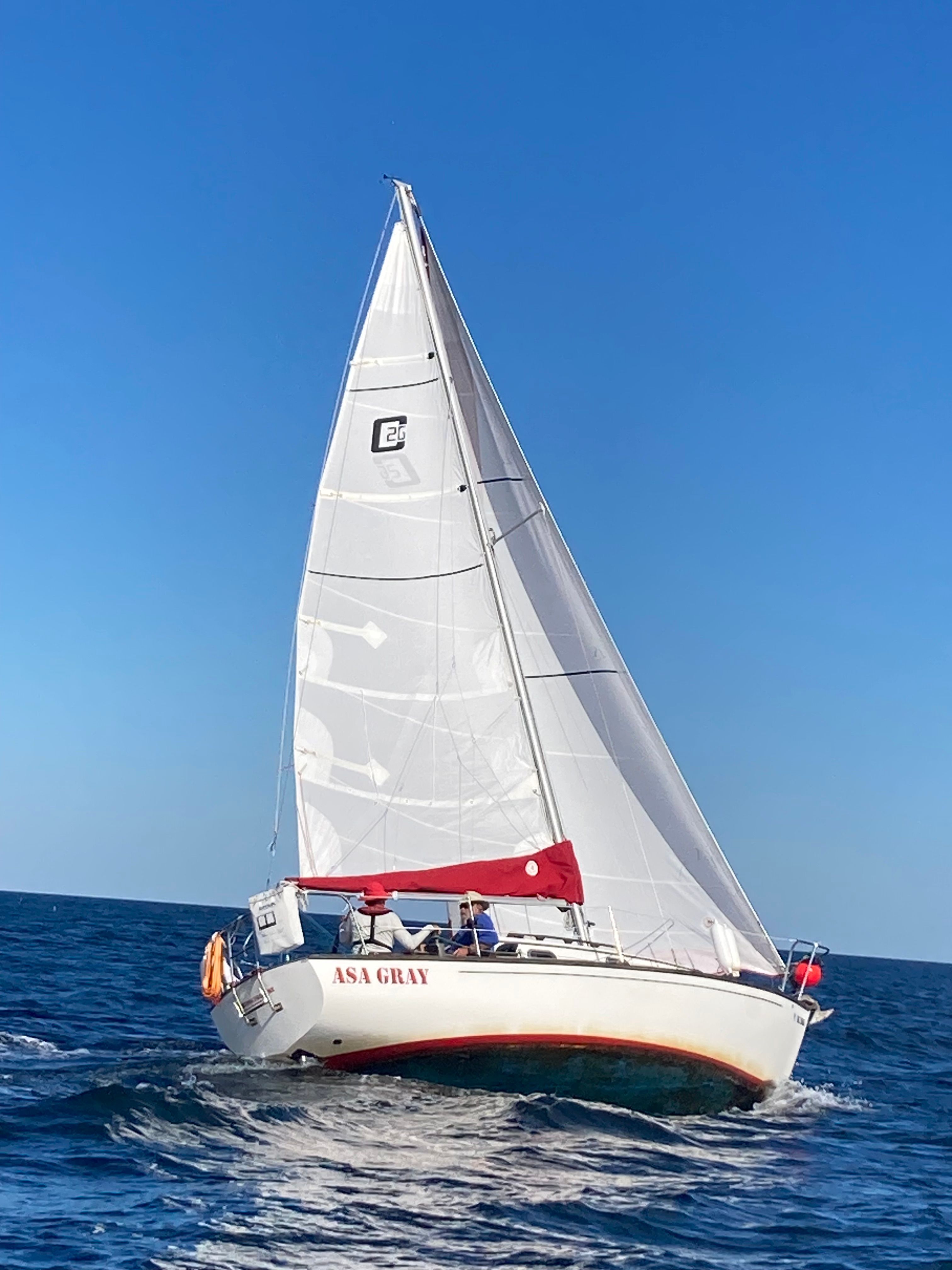 1986 Cape Dory 26 sailboat on the ocean.