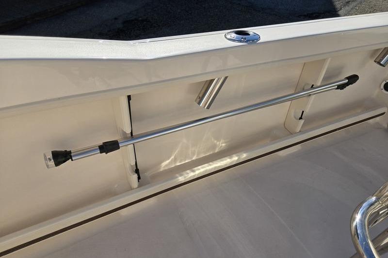 2026 Grady-White Fisherman 180 boat interior with rod holder and sleek design.