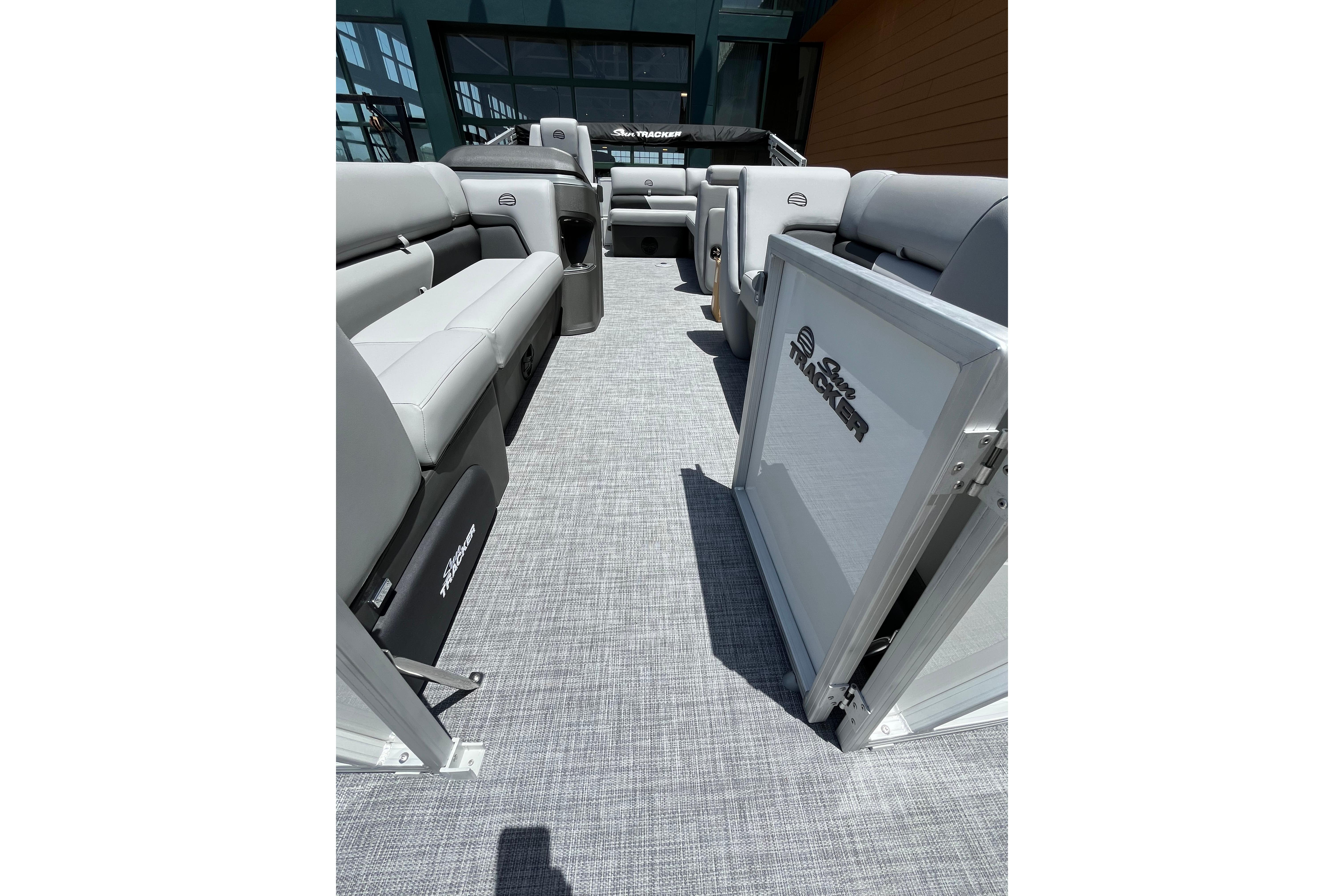 2026 Sun Tracker Party Barge 20 DLX interior with spacious seating and modern design.