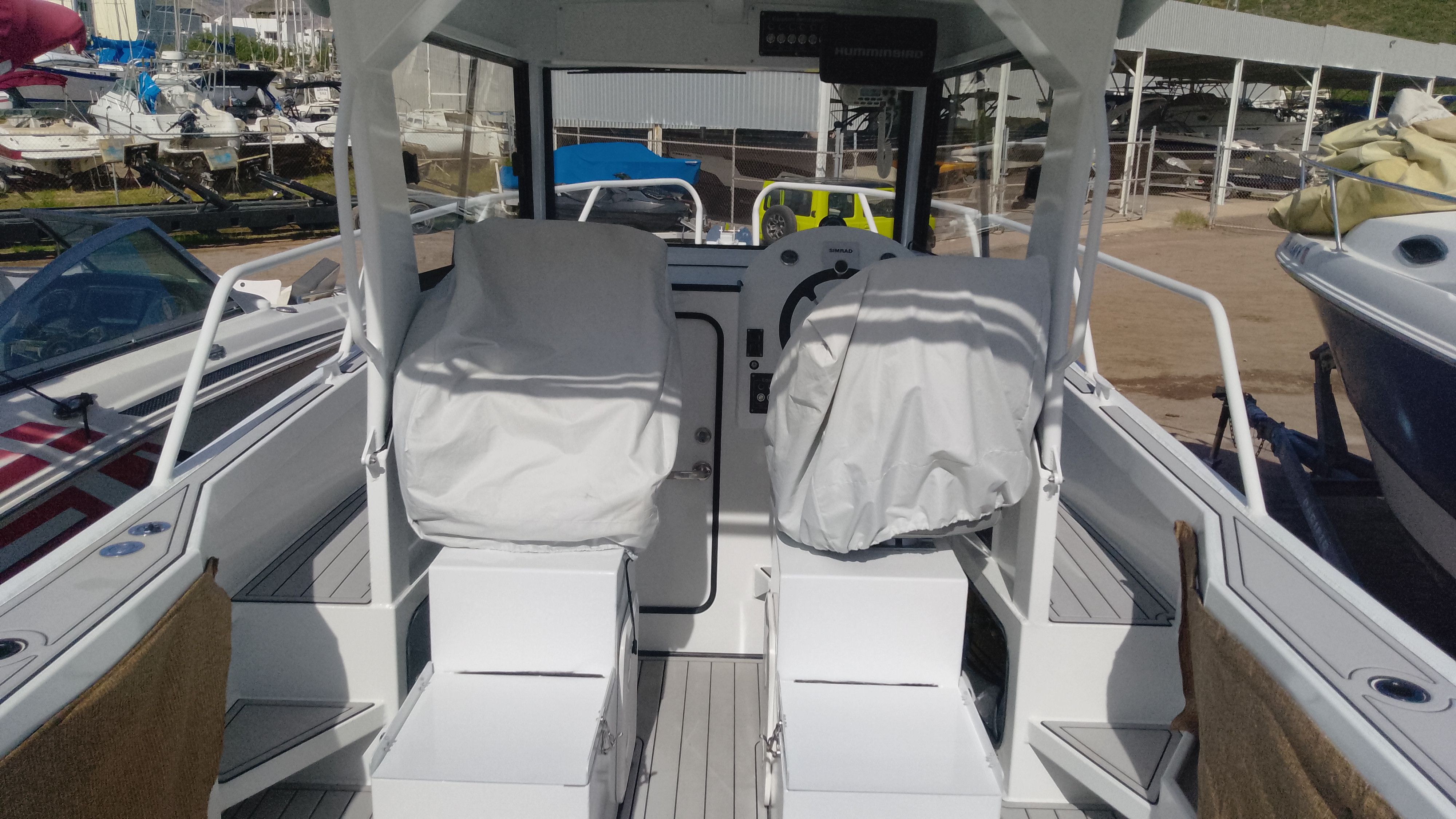 Interior view of Gospel Boat 7.5M, 2024 model, docked at marina.