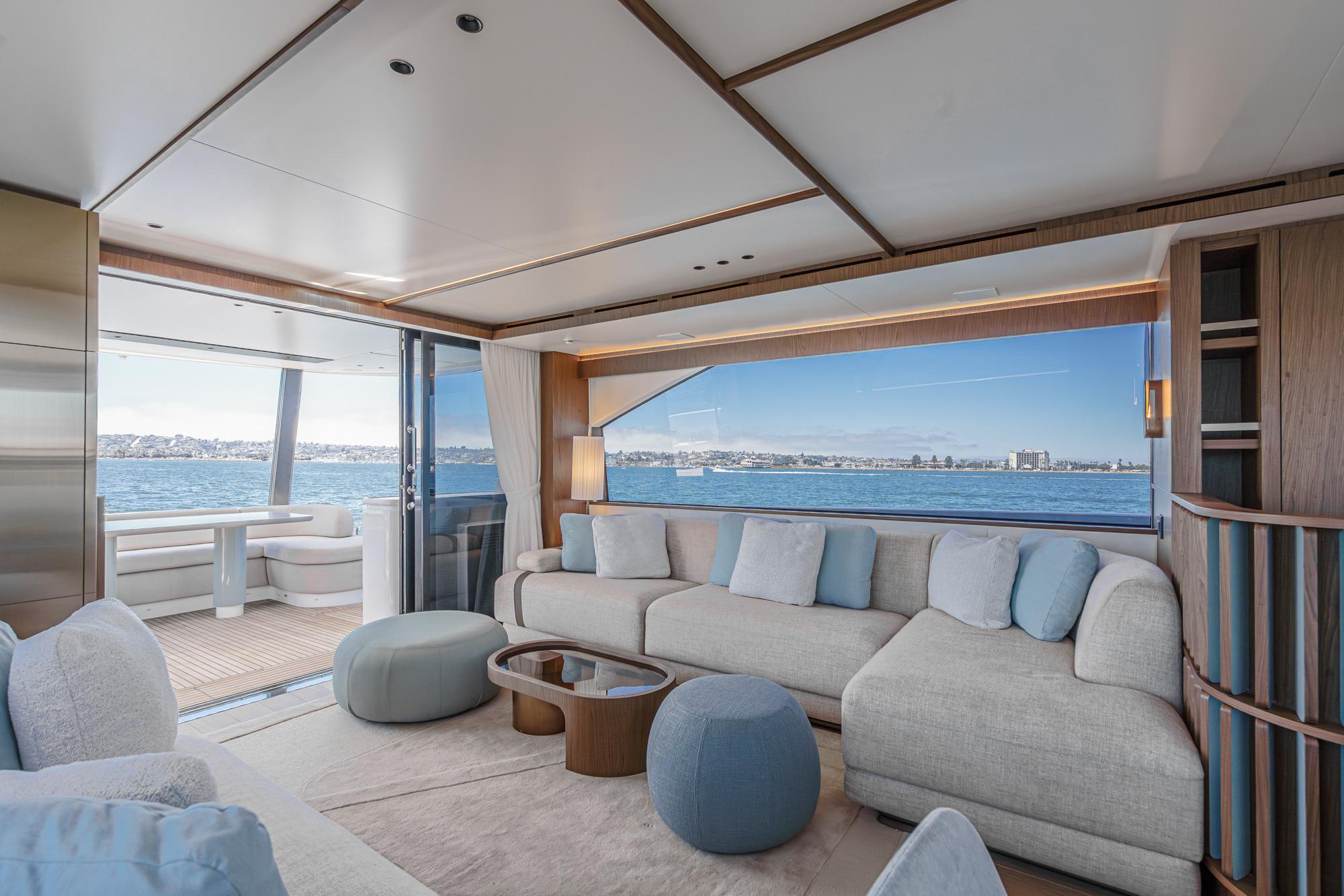Luxurious interior of 2026 Azimut Fly 72 yacht with ocean view and modern furnishings.