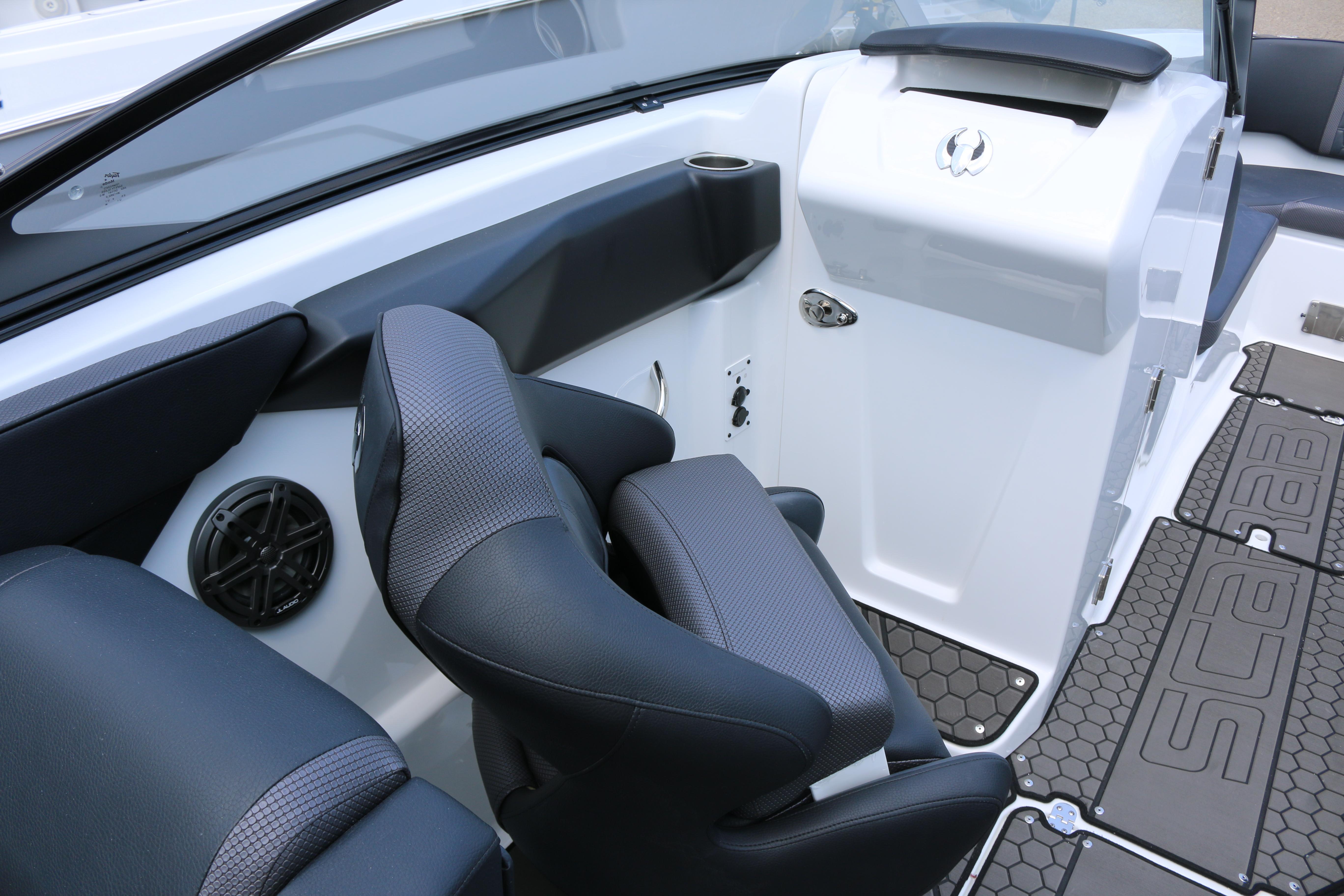 Interior of 2026 Scarab 255 LX boat with sleek seating and modern design.