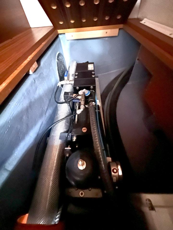Engine compartment of 2023 Ice Yachts 52 RS, showcasing mechanical components and wiring.