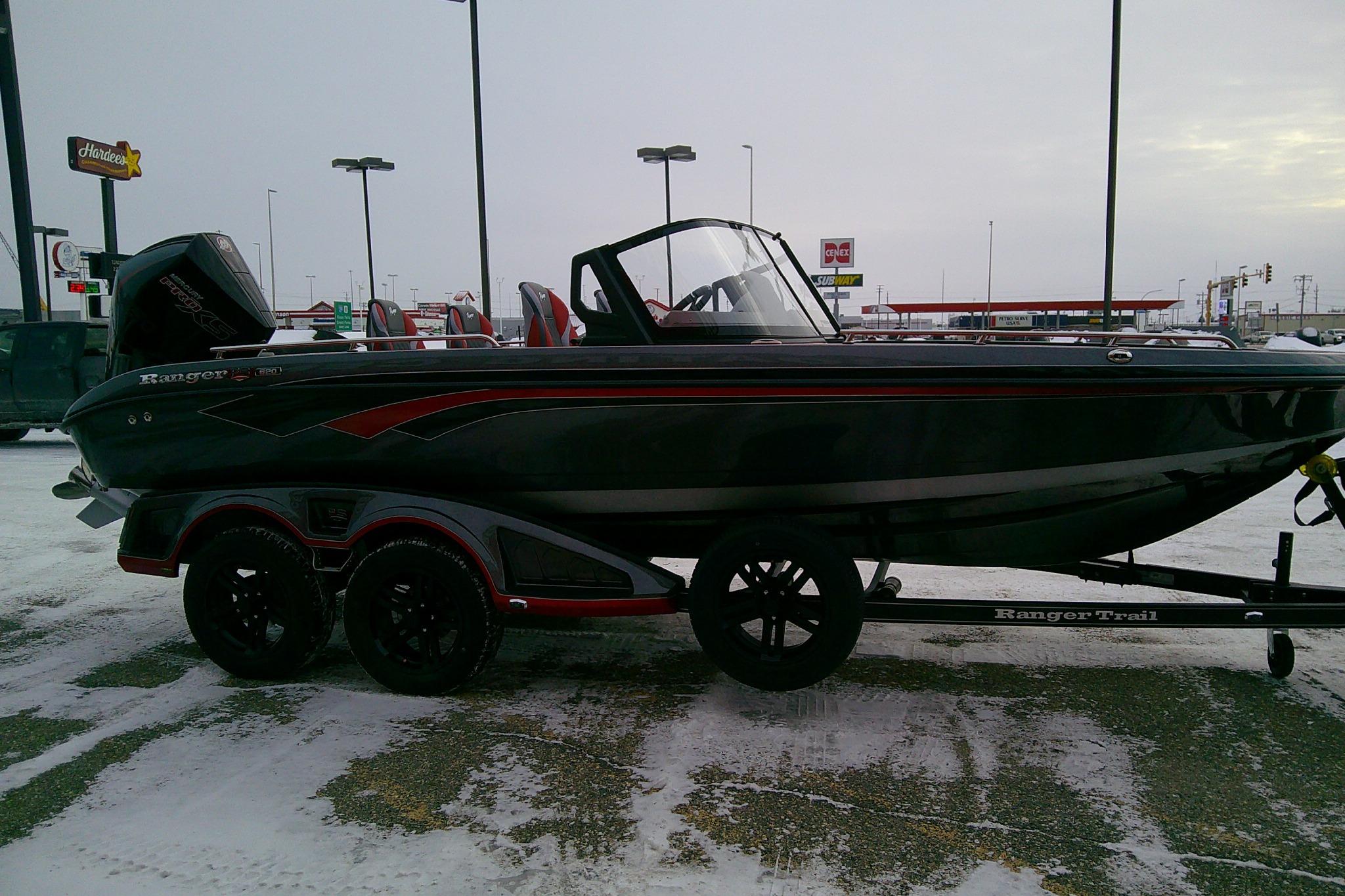 2026 Ranger 620FS Cup Equipped boat on trailer in snowy parking lot.