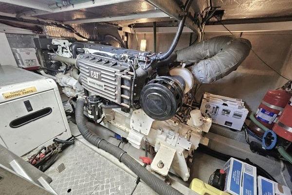 Engine room of a 2005 Sunseeker Manhattan 66 yacht, featuring a CAT marine engine.