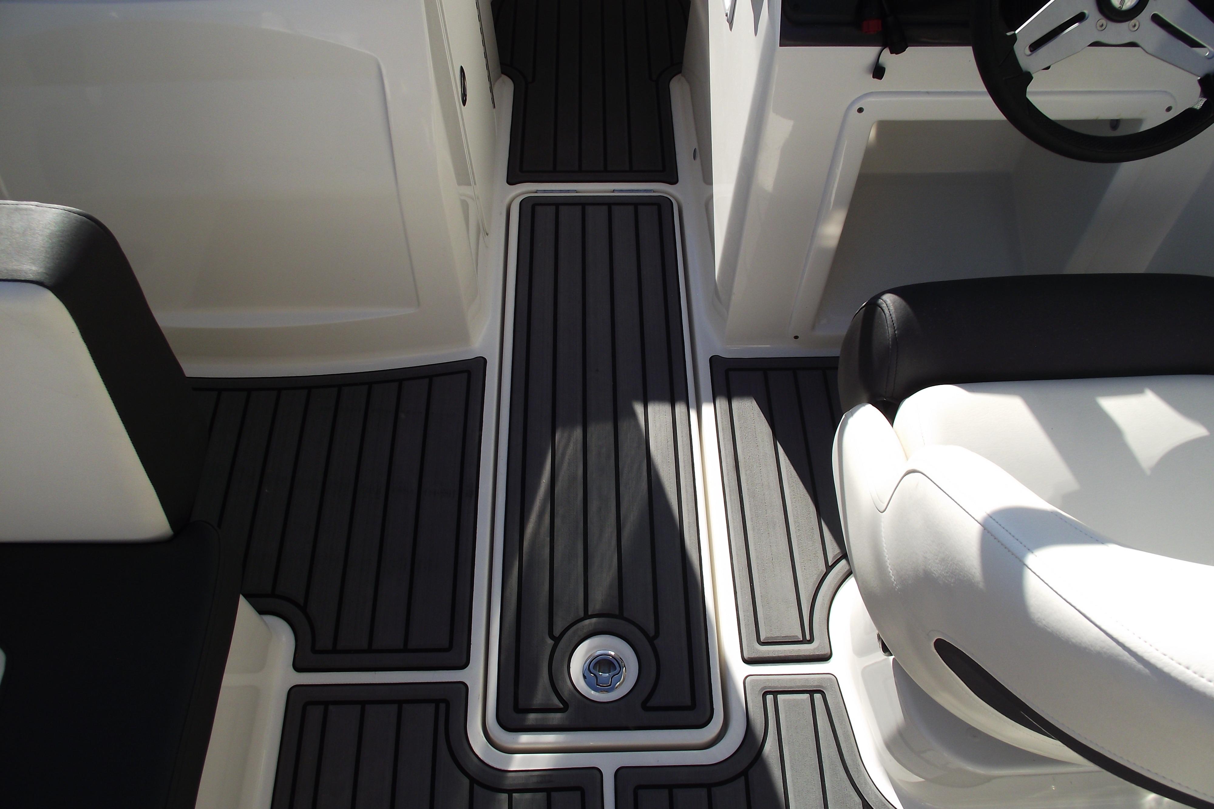 2022 Bayliner VR4 Bowrider OB interior with sleek black and white seating.