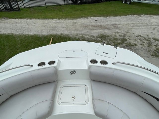 The image shows the bow of a Hurricane SS188 boat with seating and cup holders.