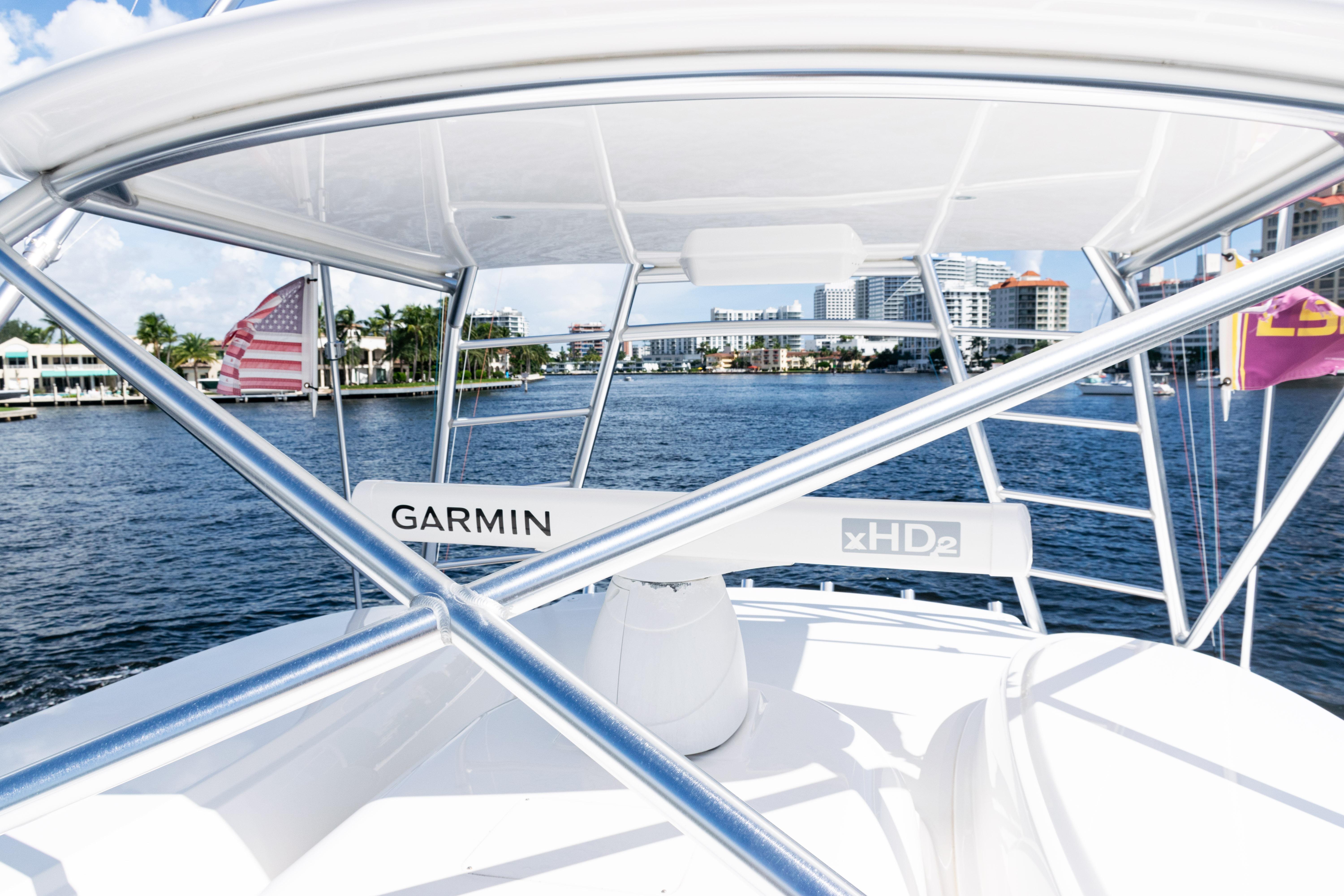 2021 Viking 44 Open boat with Garmin xHD2 radar on a sunny waterfront.