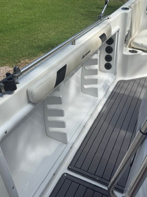 The image shows the deck of a 2016 Hurricane SunDeck Sport 231 OB boat.