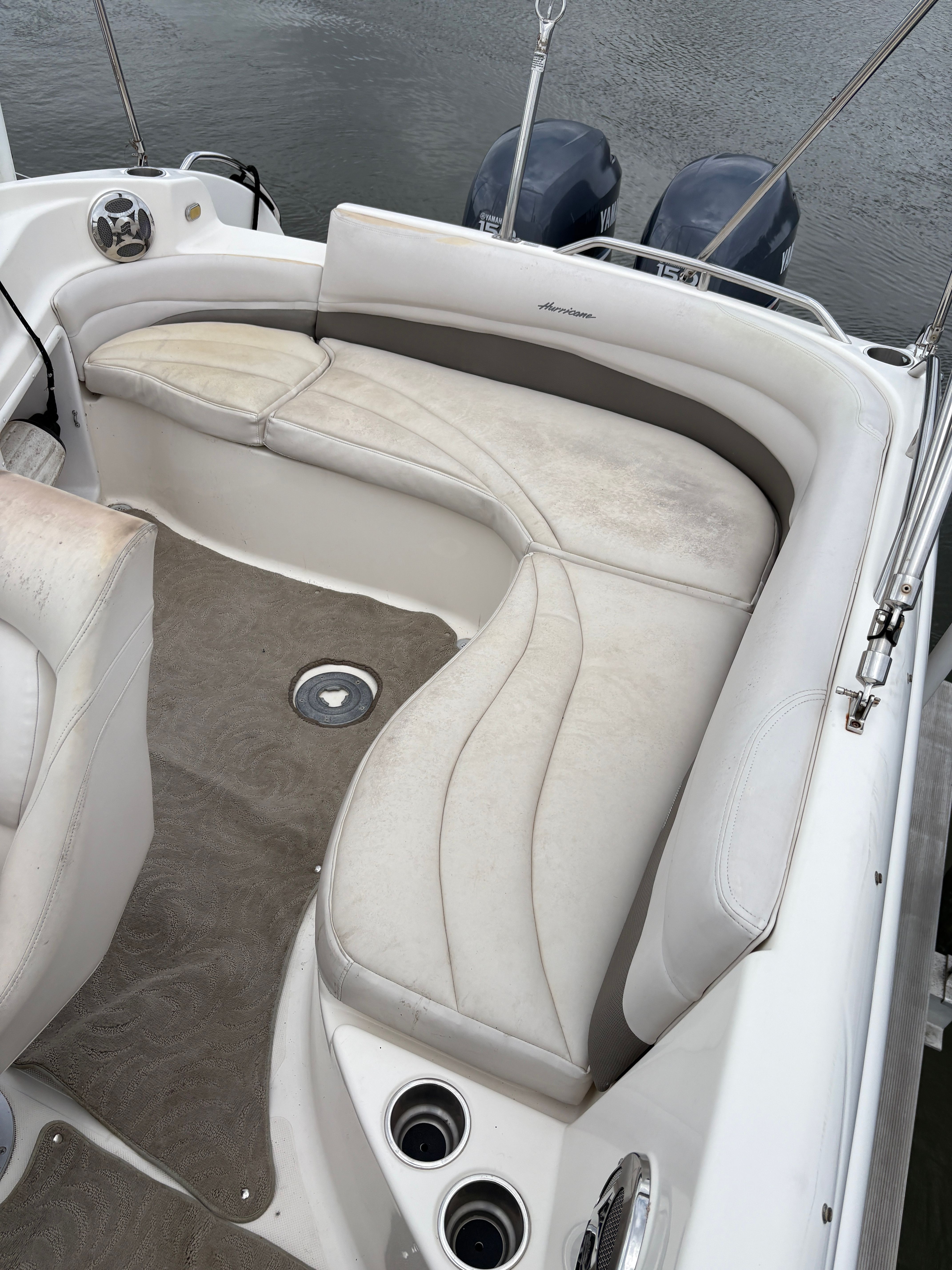 Interior of a 2009 Hurricane SUN DECK 260 boat with seating area.