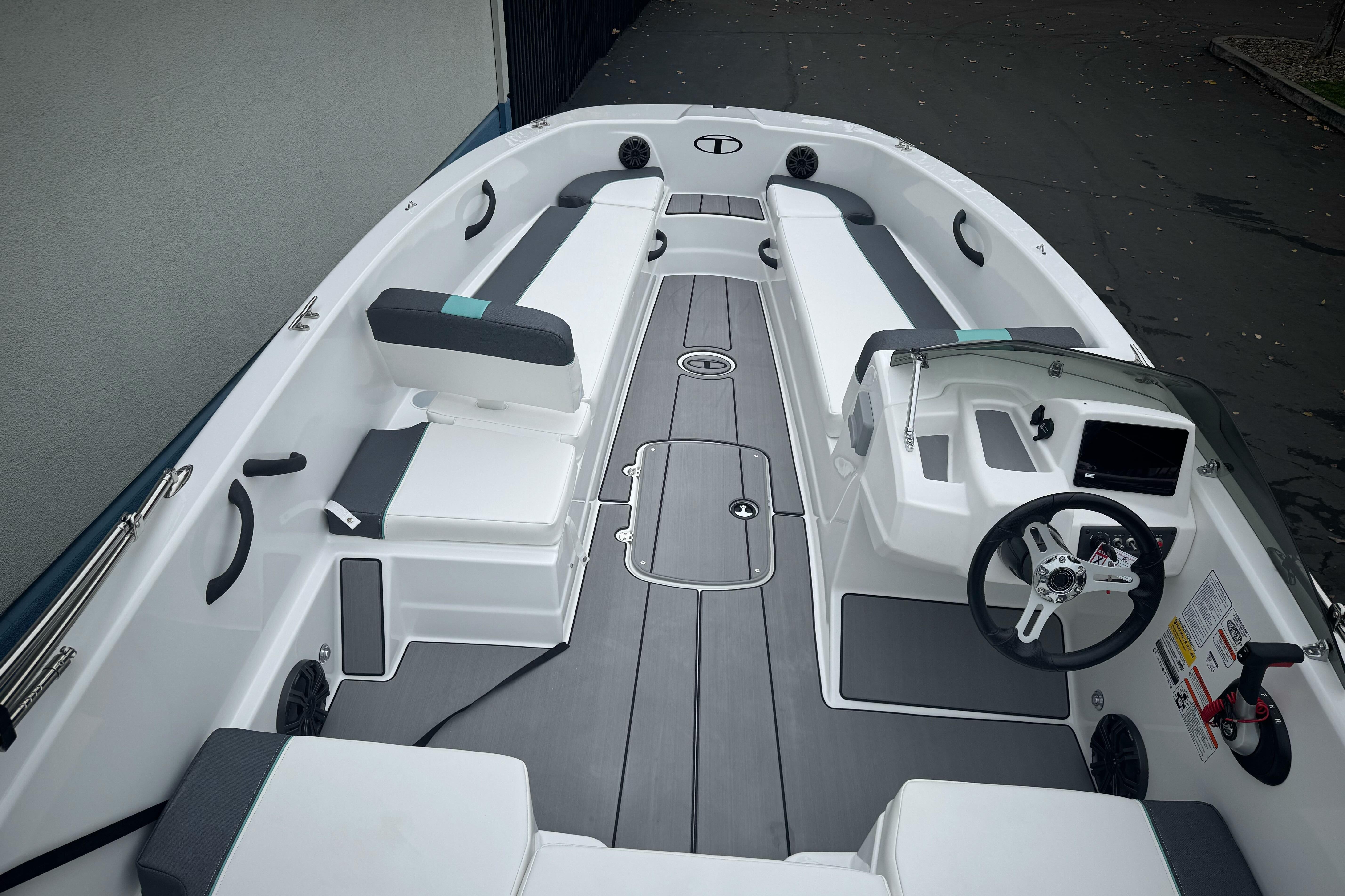 2026 Tahoe T18 boat interior with sleek seating, modern dashboard, and spacious layout.