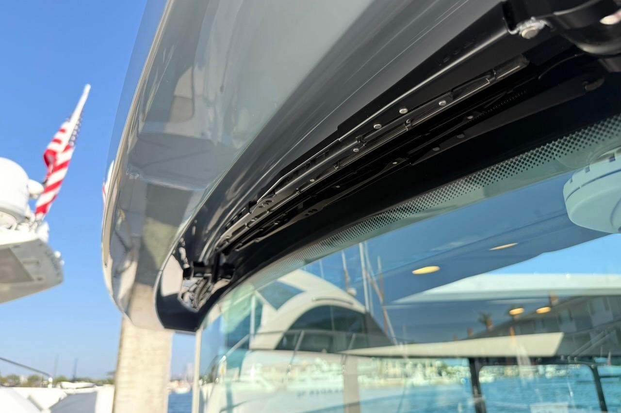 Close-up of 2024 Saxdor 320 GTC yacht's sleek design and window detailing.