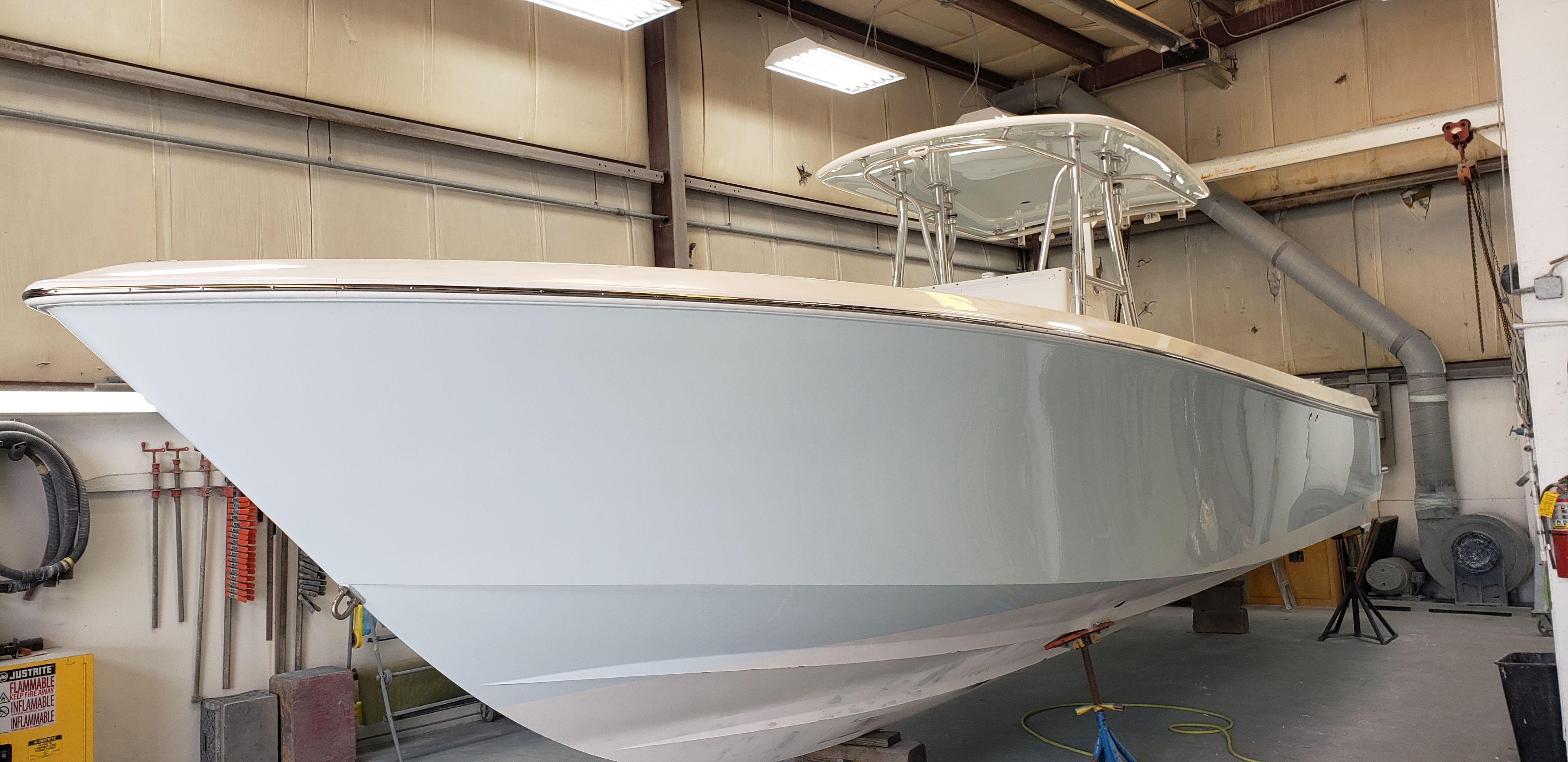 2009 Contender 33 Tournament boat in a workshop.
