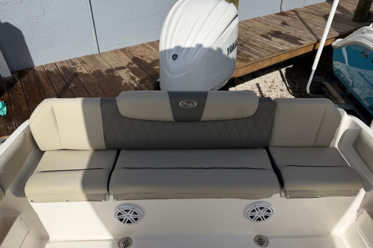 2026 Key West 239 FSR boat seating with Yamaha engine in background.