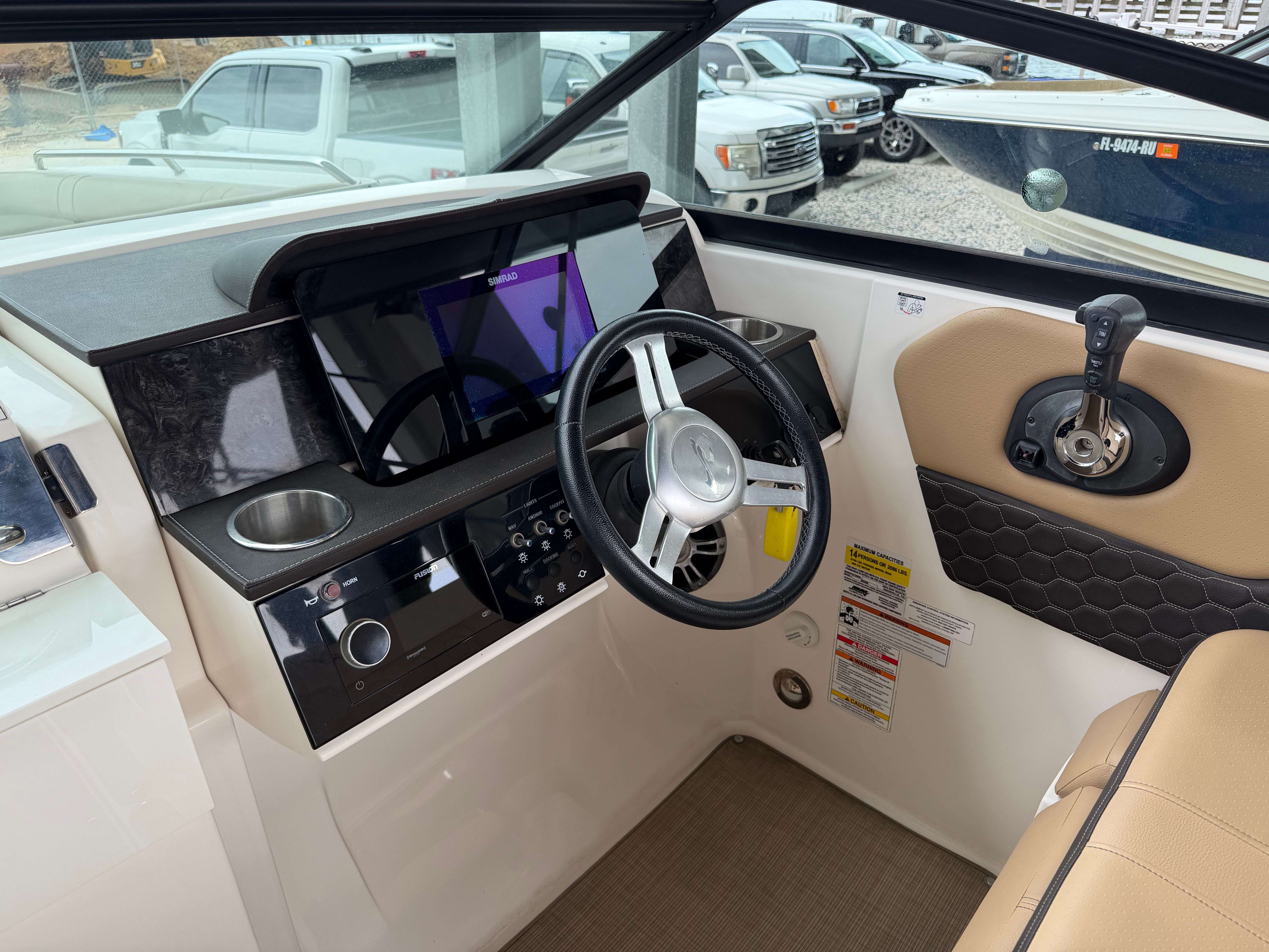 Interior view of 2020 Sea Ray SDX 250 Outboard cockpit.