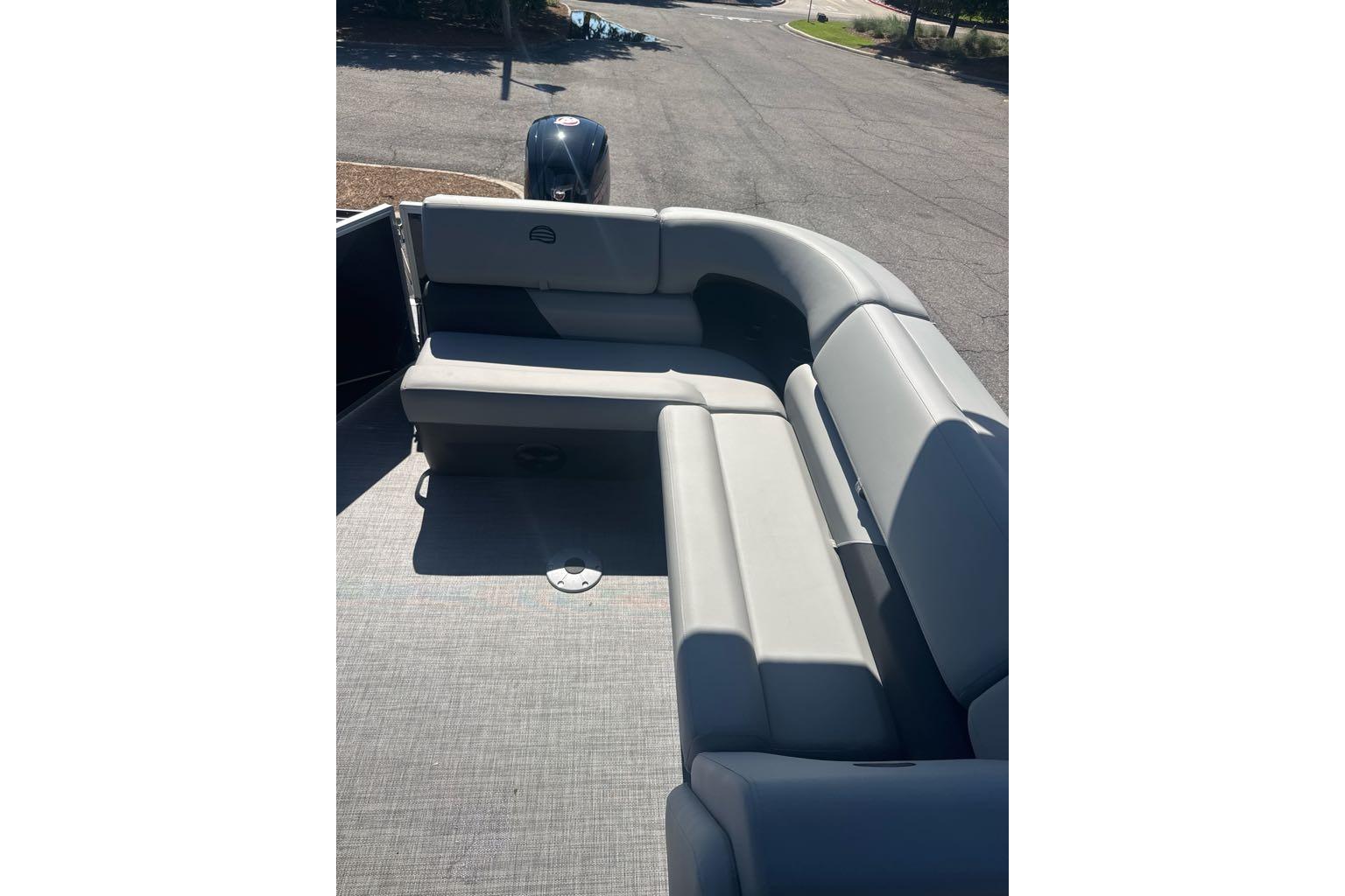 2026 Sun Tracker Party Barge 20 DLX with spacious seating and modern design.