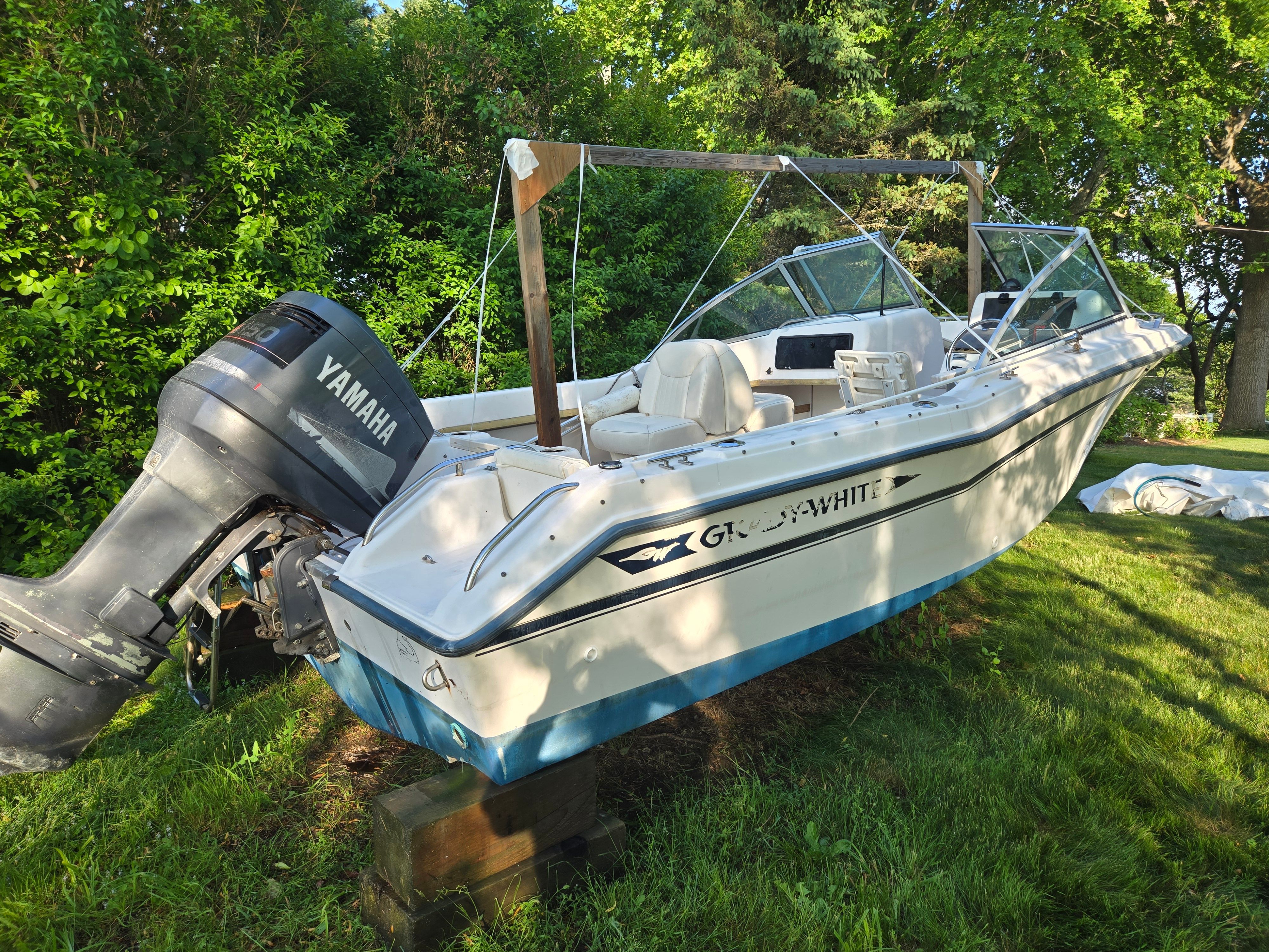 1994 Grady-White Tournament 192 on grass, featuring a Yamaha outboard motor.