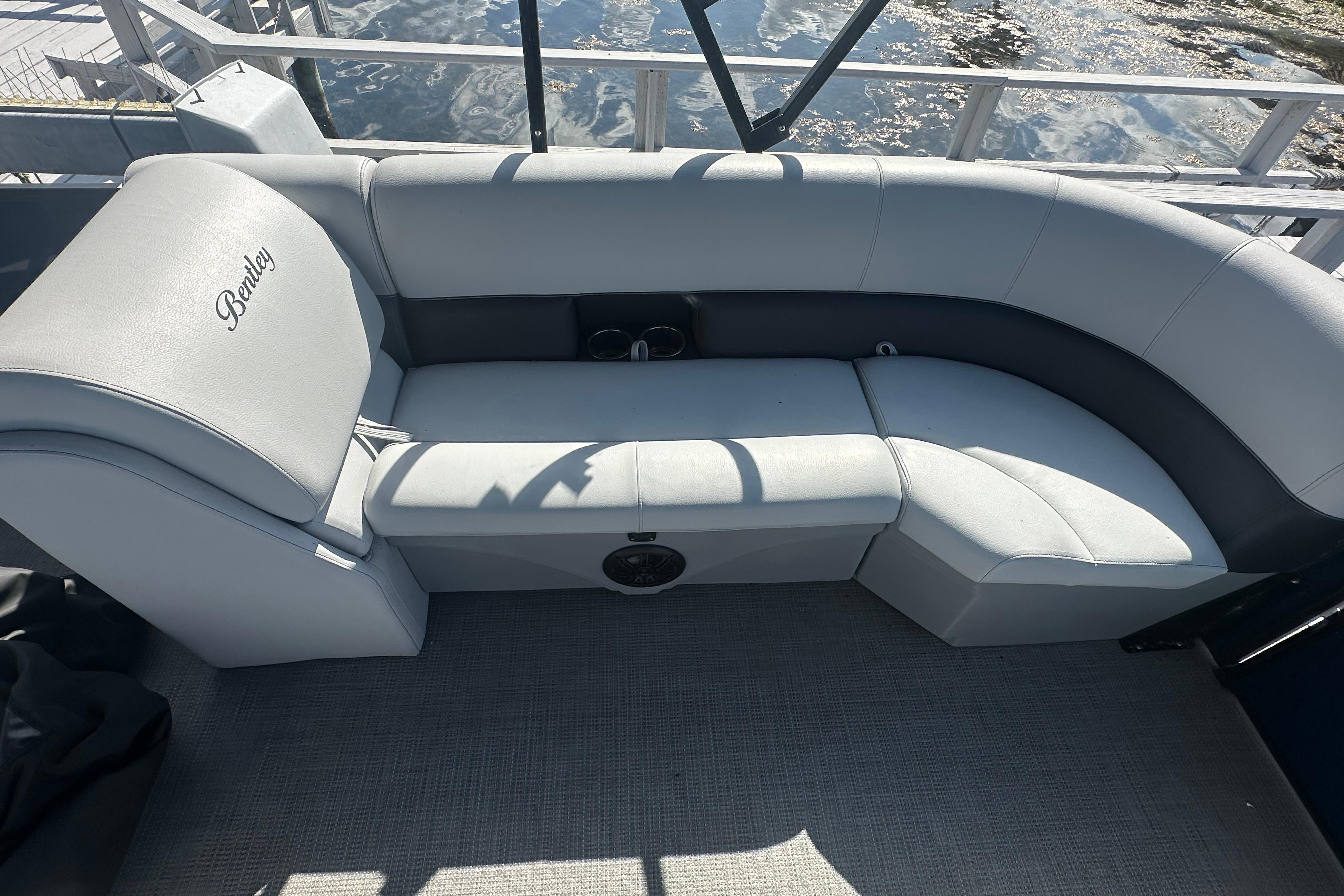 2023 Bentley Pontoons Legacy 243 Swingback with luxurious seating and elegant design.