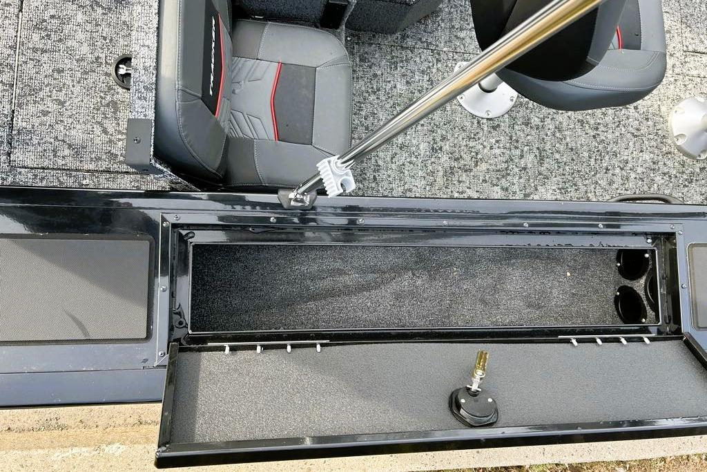 2026 Tracker Targa V-18 Combo boat interior with open storage compartment and seating.