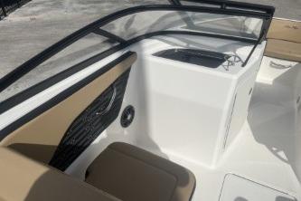 2017 Sea Ray SPX 210 Outboard boat interior with seating and console.