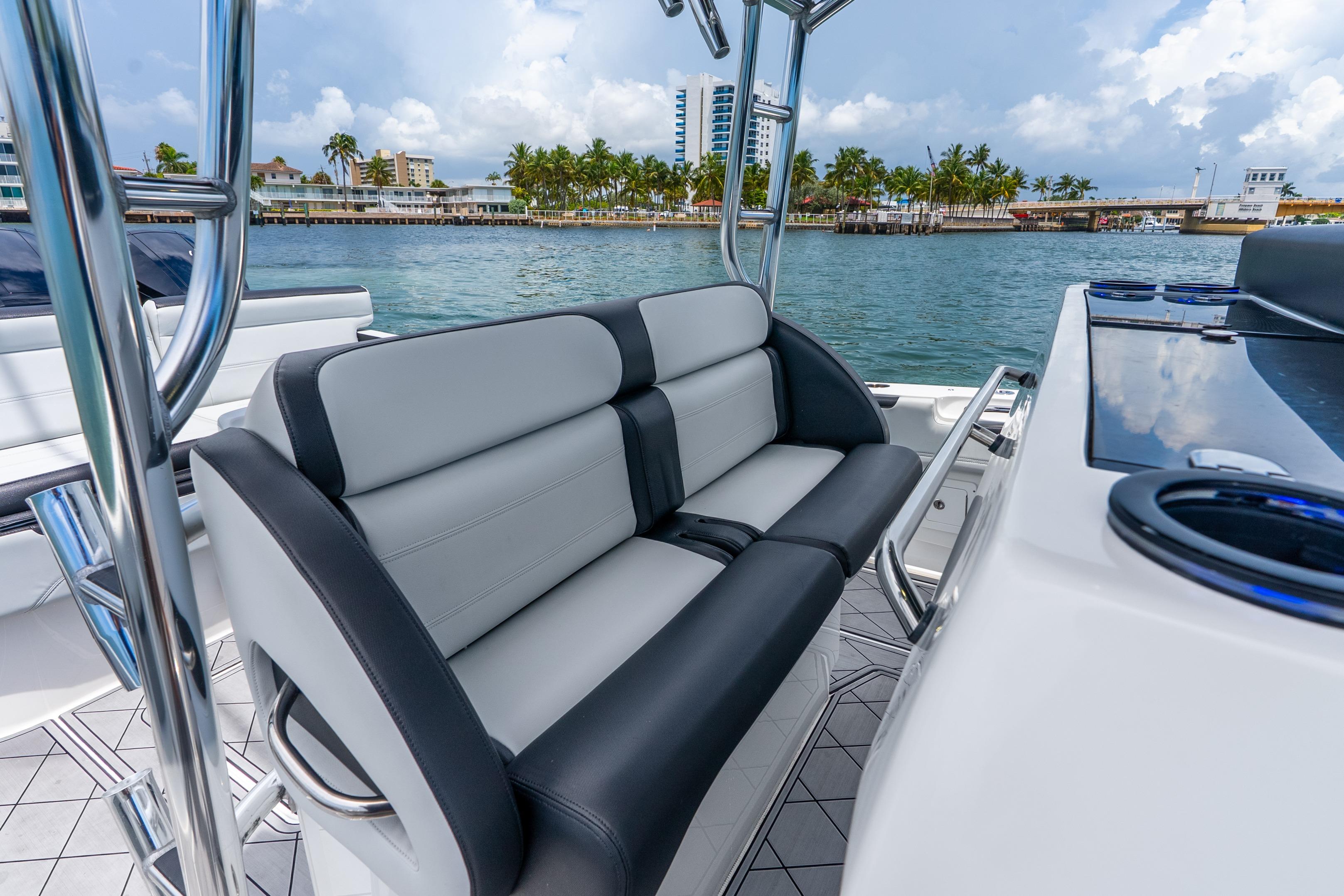 2024 Nor-Tech 452 Super Fish boat interior with sleek seating and ocean view.