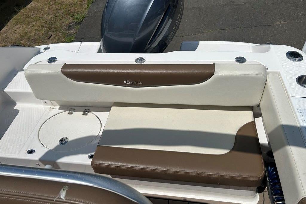 2017 Robalo R200ES boat seating with brown and white upholstery, showcasing sleek design.
