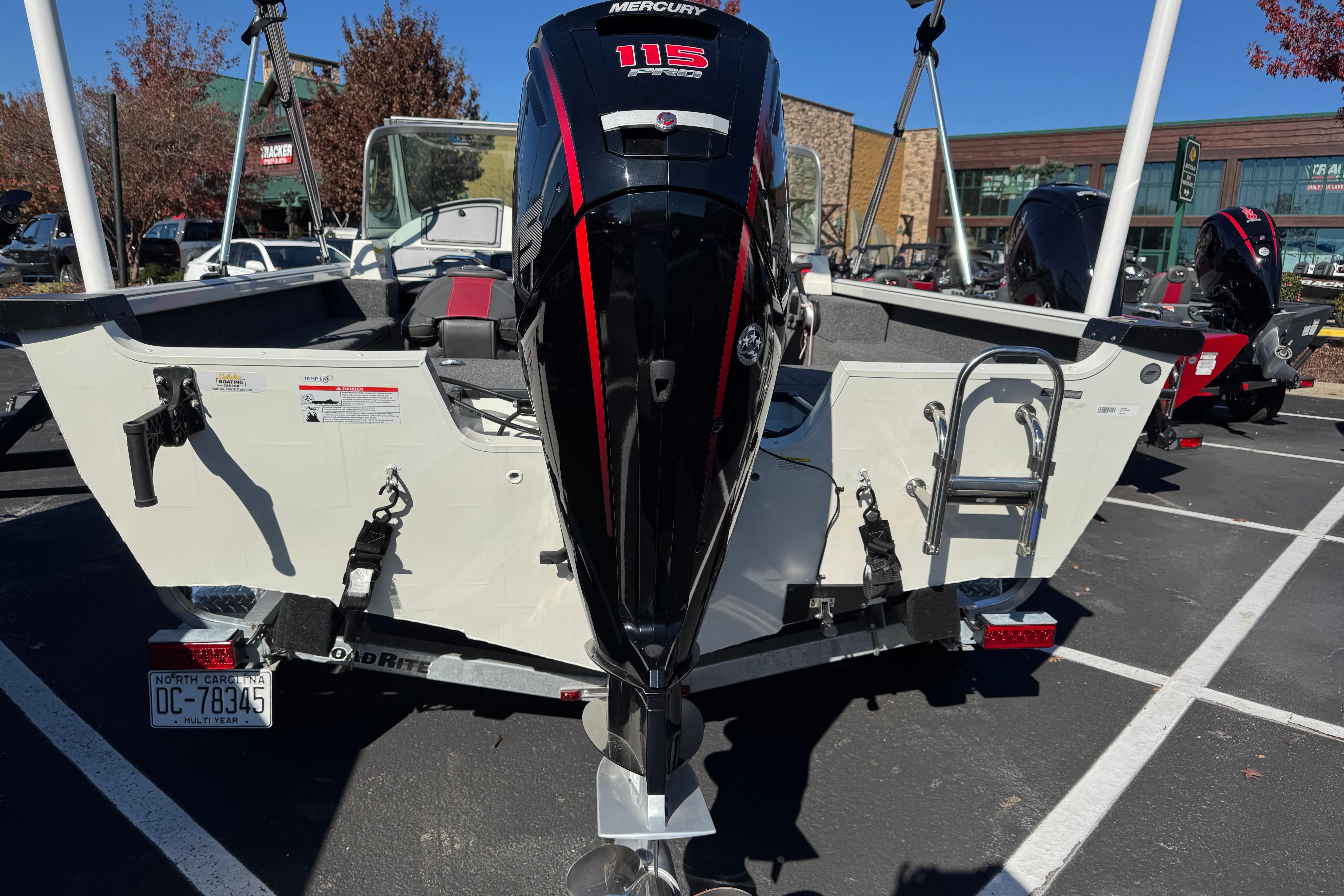 2020 Ranger VS1682 WT boat with Mercury 115 engine in parking lot.