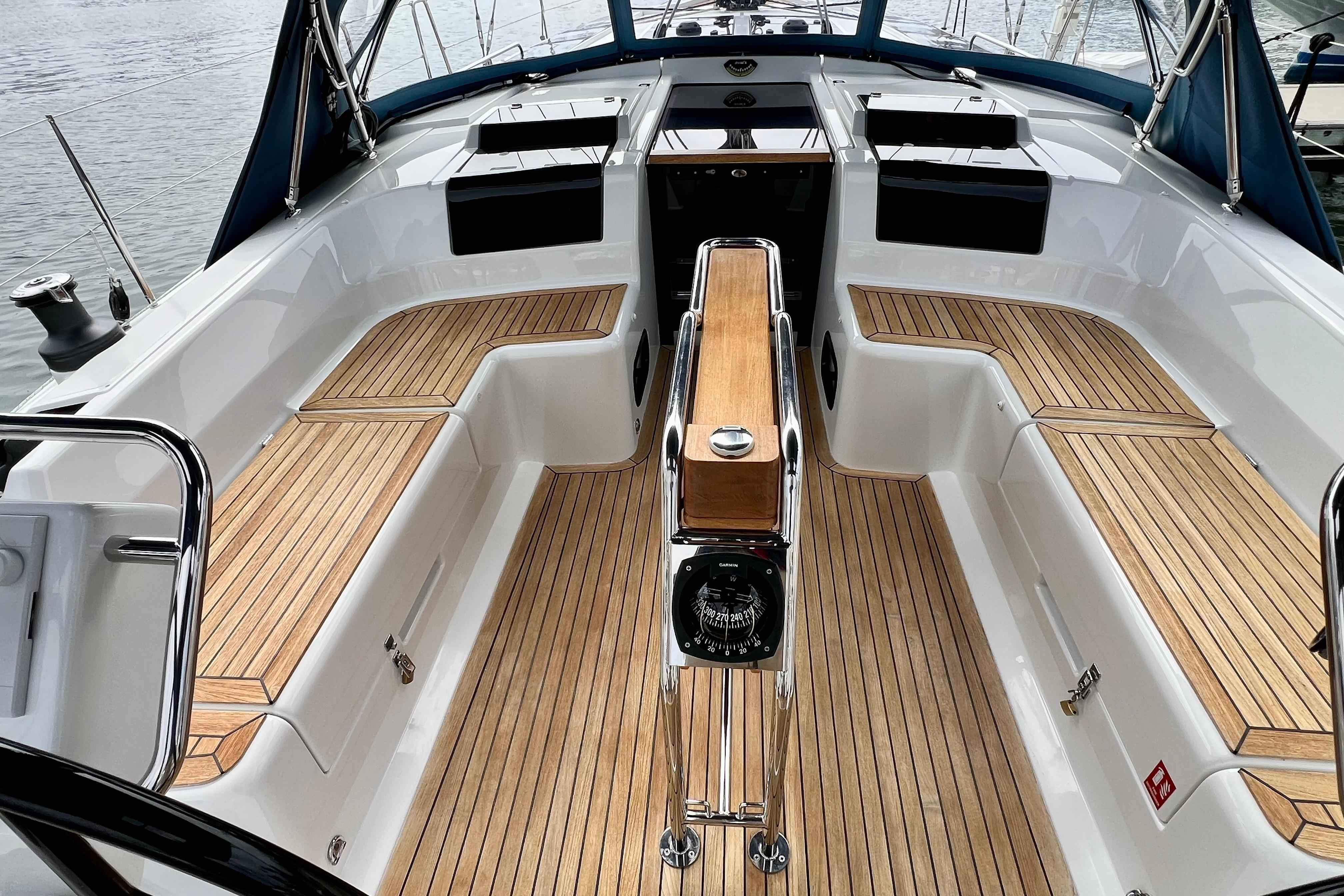 2016 Hanse 455 yacht cockpit with teak flooring and sleek design.