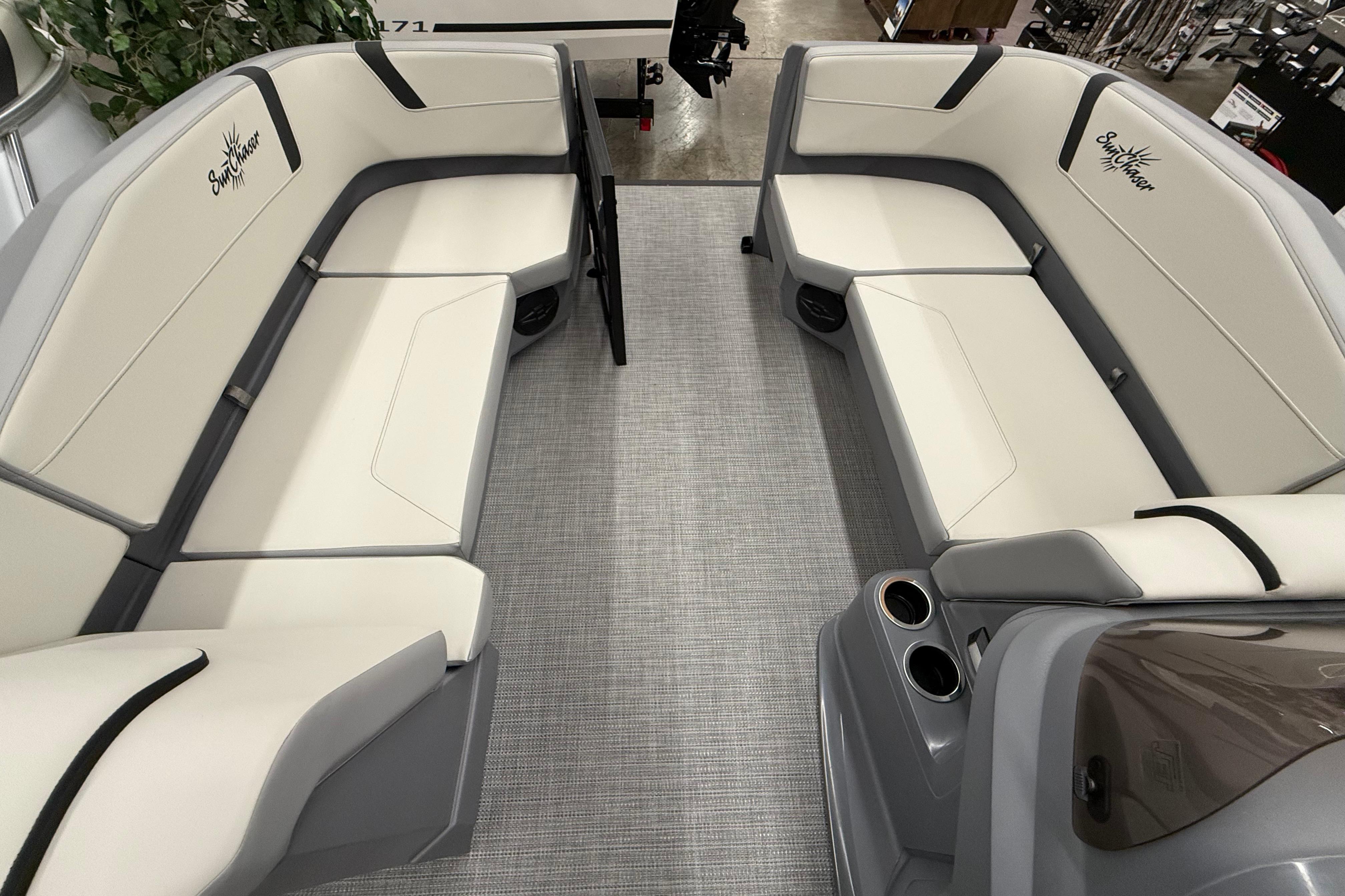 Luxurious seating on 2025 SunChaser Lucerne 22 LR DH pontoon boat, featuring elegant upholstery.