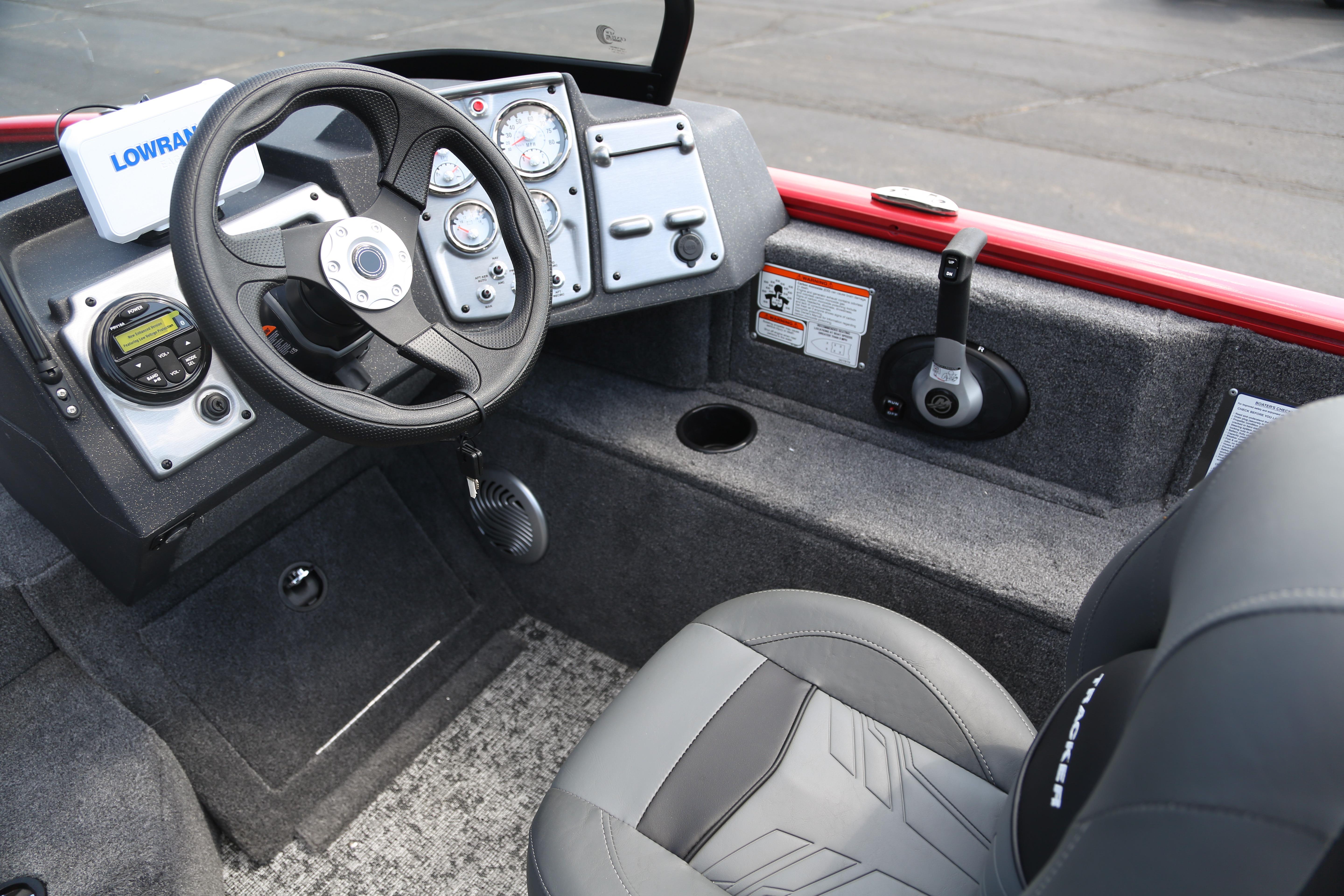 2026 Tracker Pro Guide V-175 Combo boat interior with steering wheel and control panel.