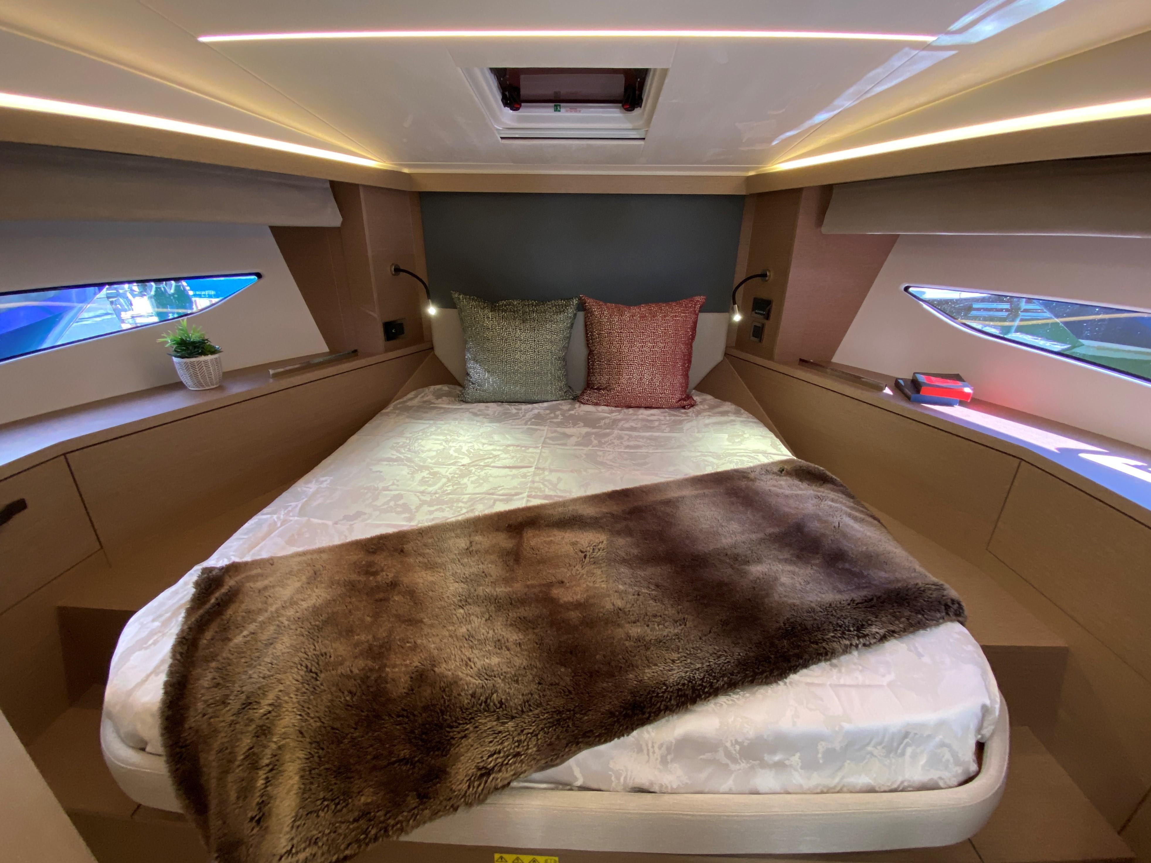 Luxurious bedroom in Prestige 420 yacht, 2023 model.