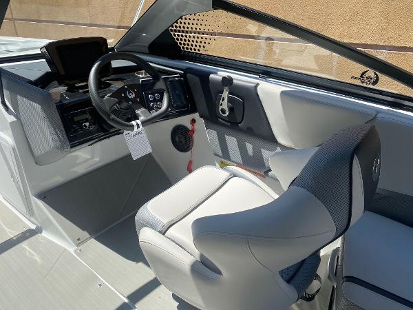 2025 Scarab 235 SE boat interior with modern steering and comfortable seating.