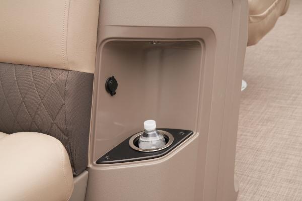 2024 Sun Tracker SportFish 22 DLX cup holder and storage compartment.