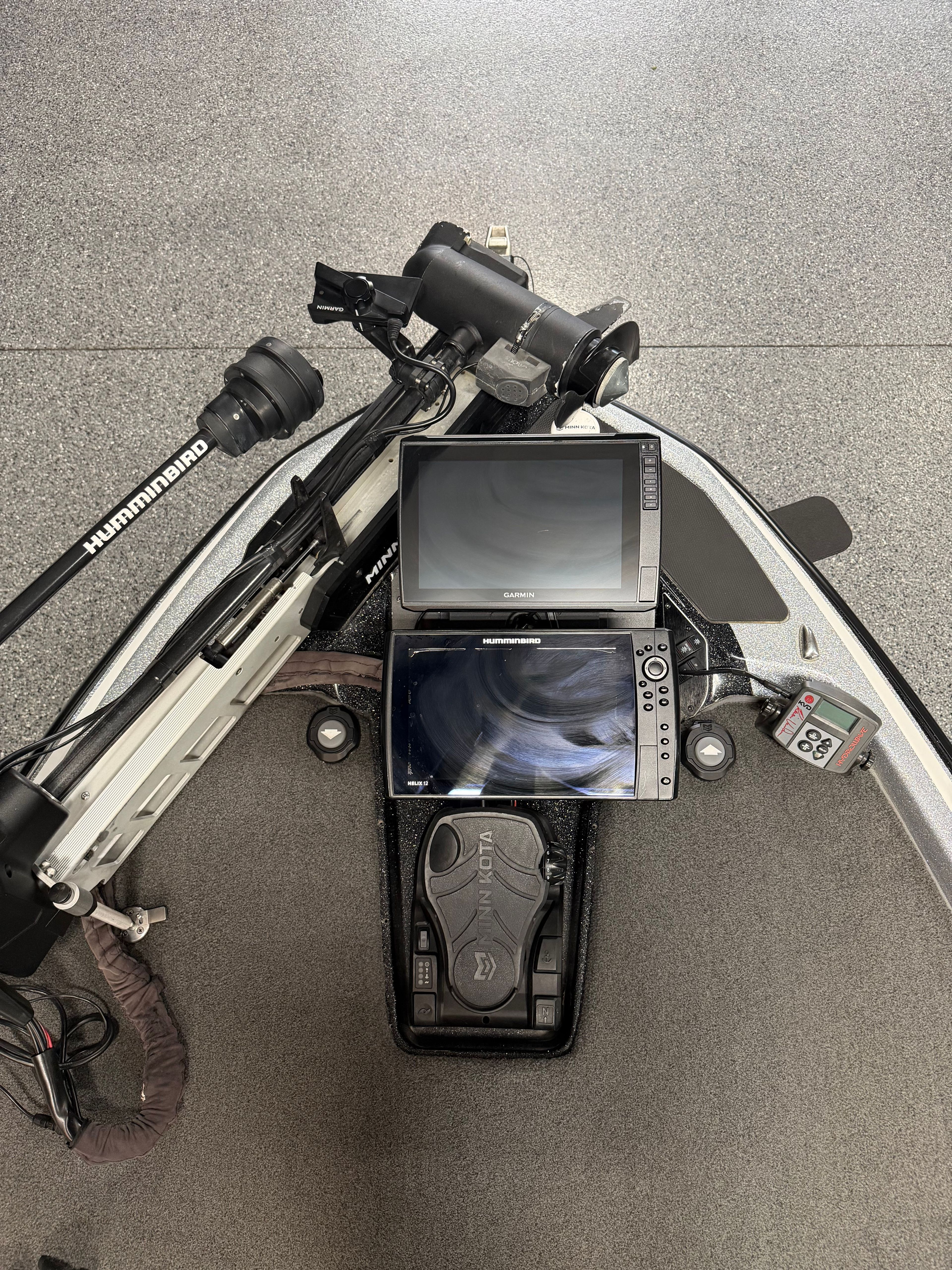 The image shows the cockpit of a Skeeter FXR21 Limited boat with electronic devices.
