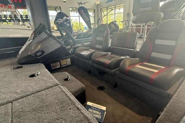 Interior of 2026 Ranger RT198P boat with seating and control panel.
