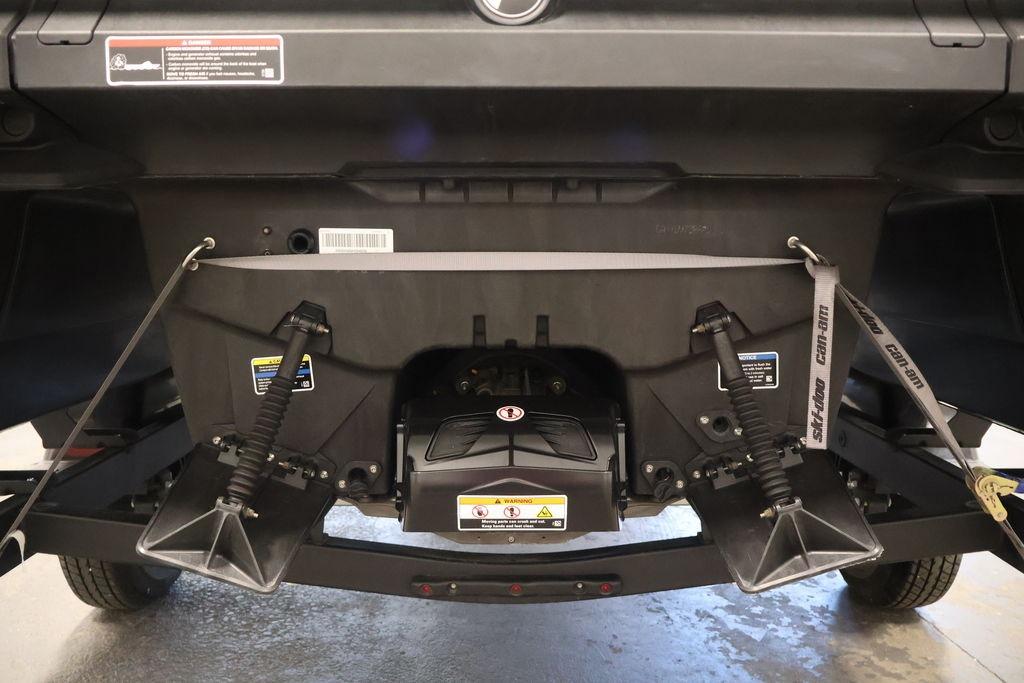 Rear view of 2023 Sea-Doo Switch Sport Compact, showcasing engine and components.