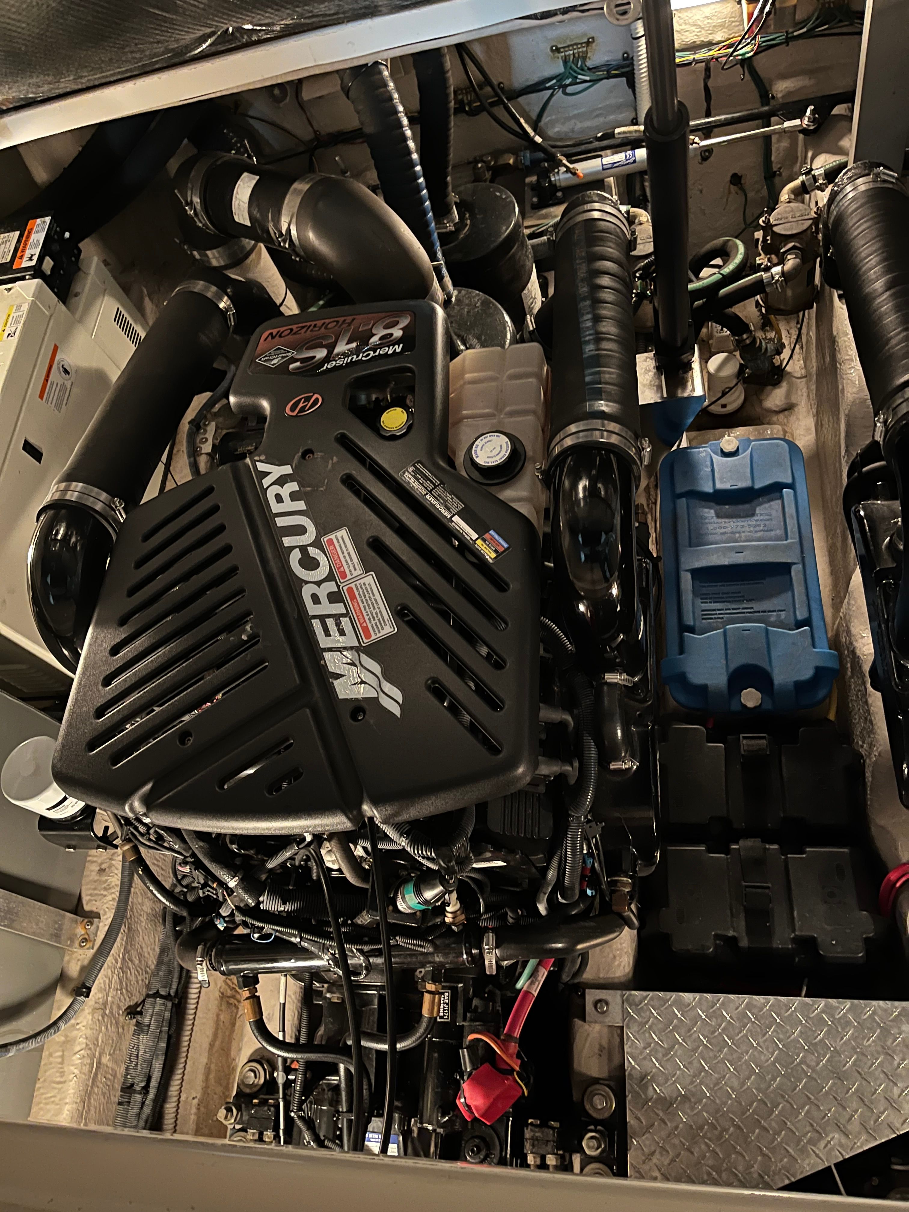 Engine compartment of a 2005 Sea Ray Sundancer with Mercury engine.