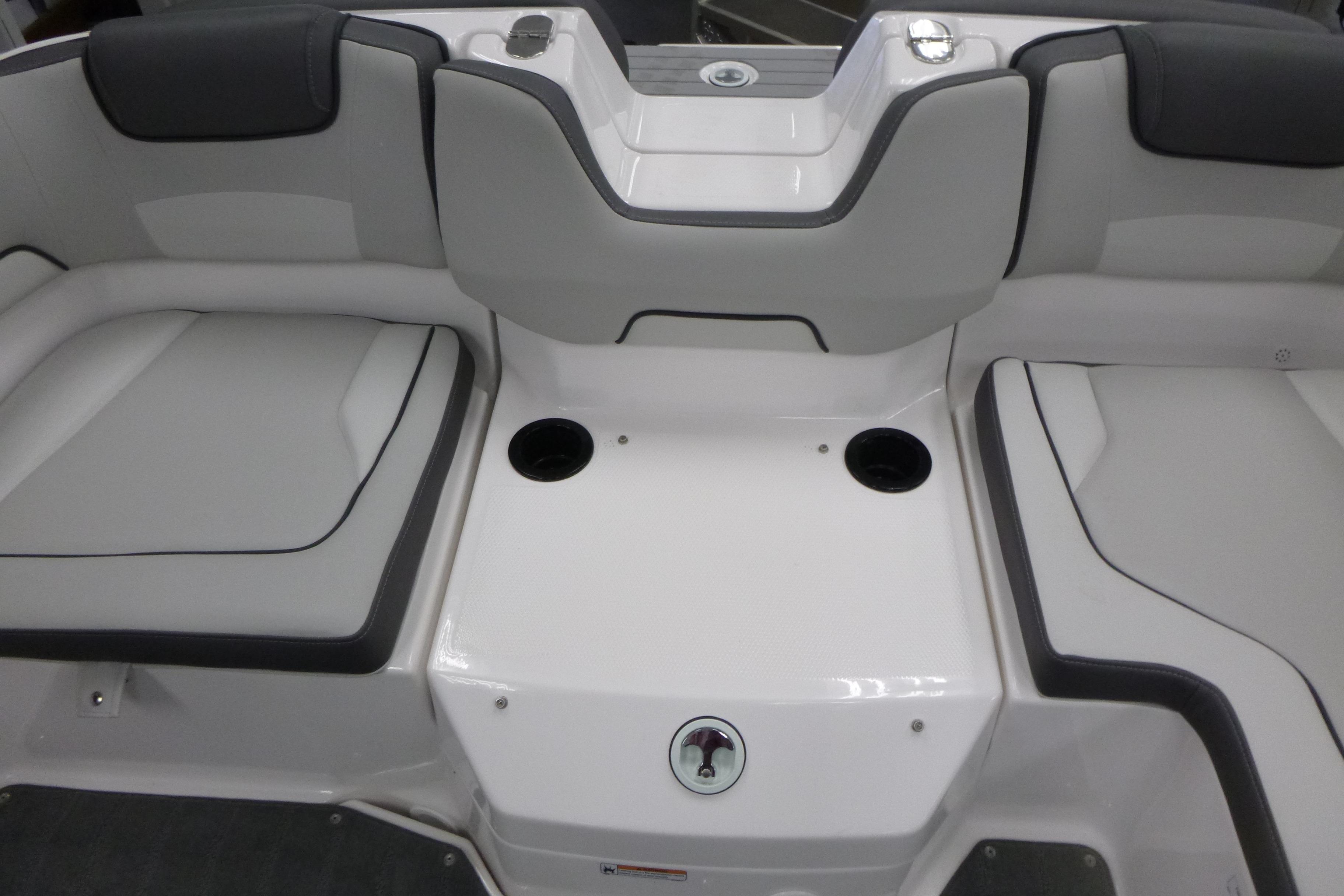 2026 Yamaha AR190 boat interior with gray seating and cup holders.