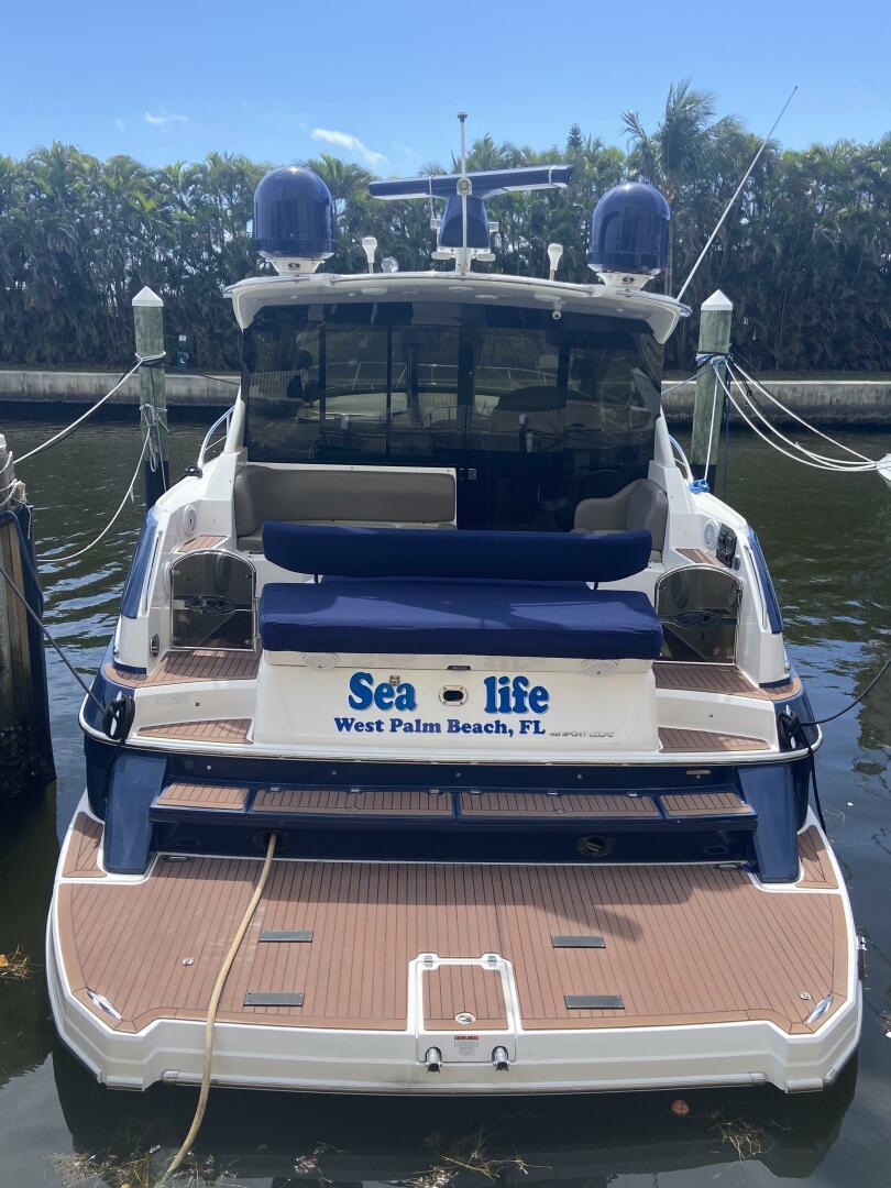 2011 Regal 46 Sport Coupe docked, named "Sea-life," West Palm Beach, FL.